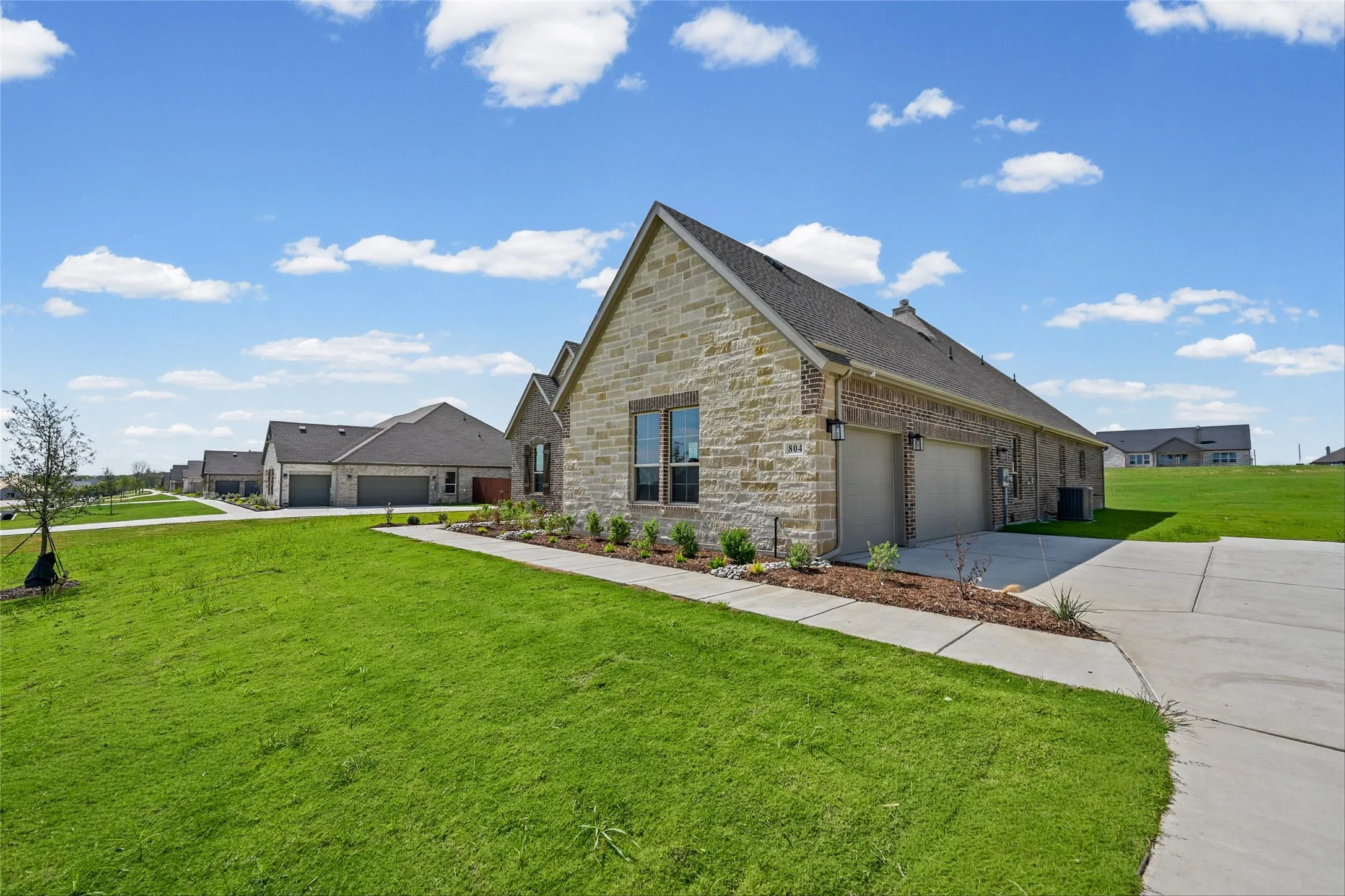 Stone and brick exterior with a gabled roof