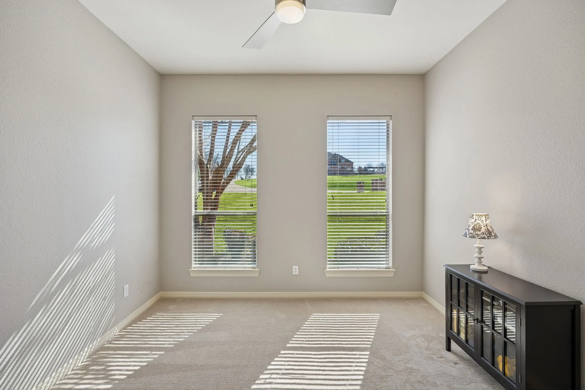 Secondary Bedroom on first floor of the home has a full size closet and an ensuite bathroom.