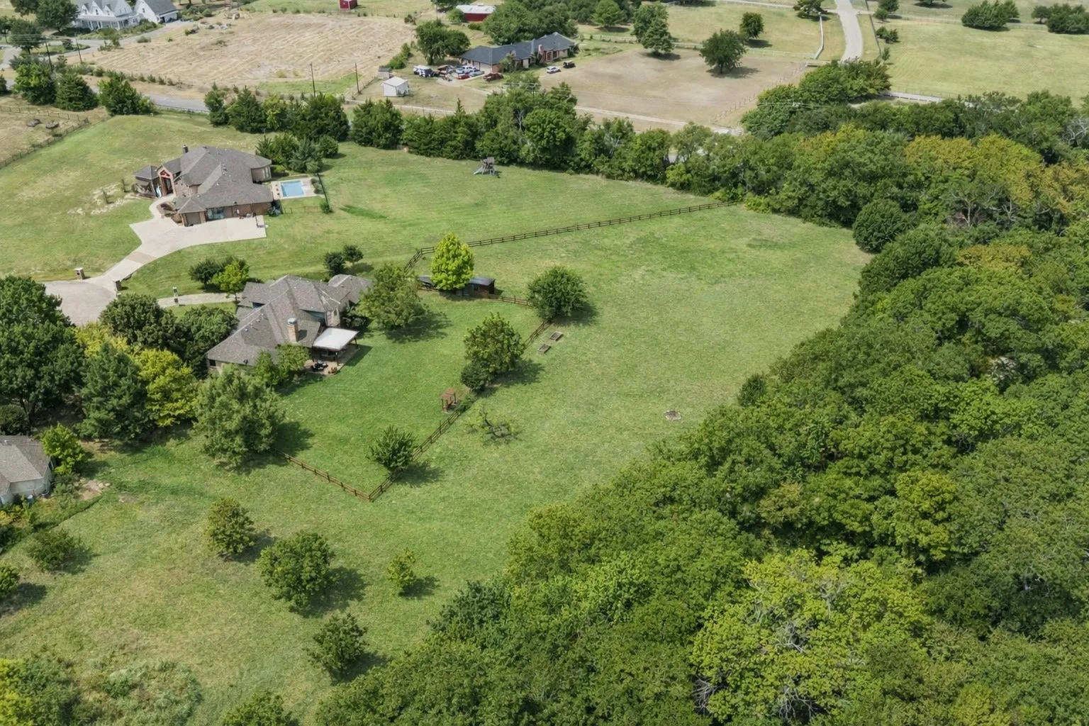 This amazing property sits on a quiet cul-de-sac with over 3 acres and is surrounded by lush green trees and natural landscaping that offers serenity and seclusion and is just minutes from Trinity Trail and Lake Lavon and is close to upscale shopping and dining.