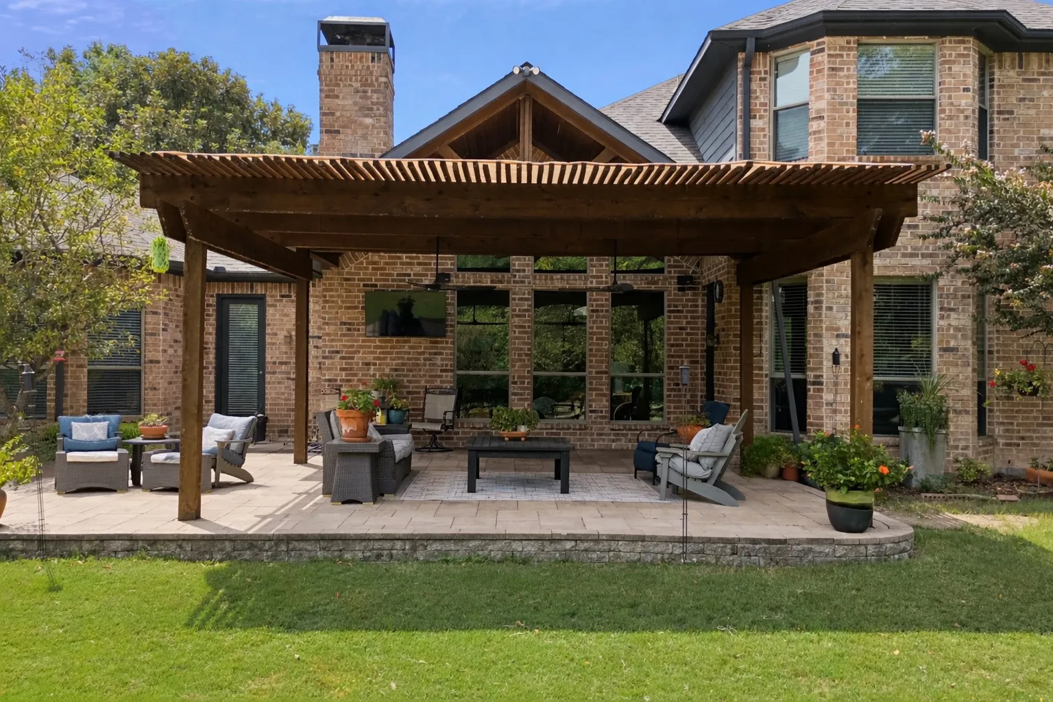 Enjoy the peace and tranquility of the extended covered patio overlooking the oversized back yard and pasture