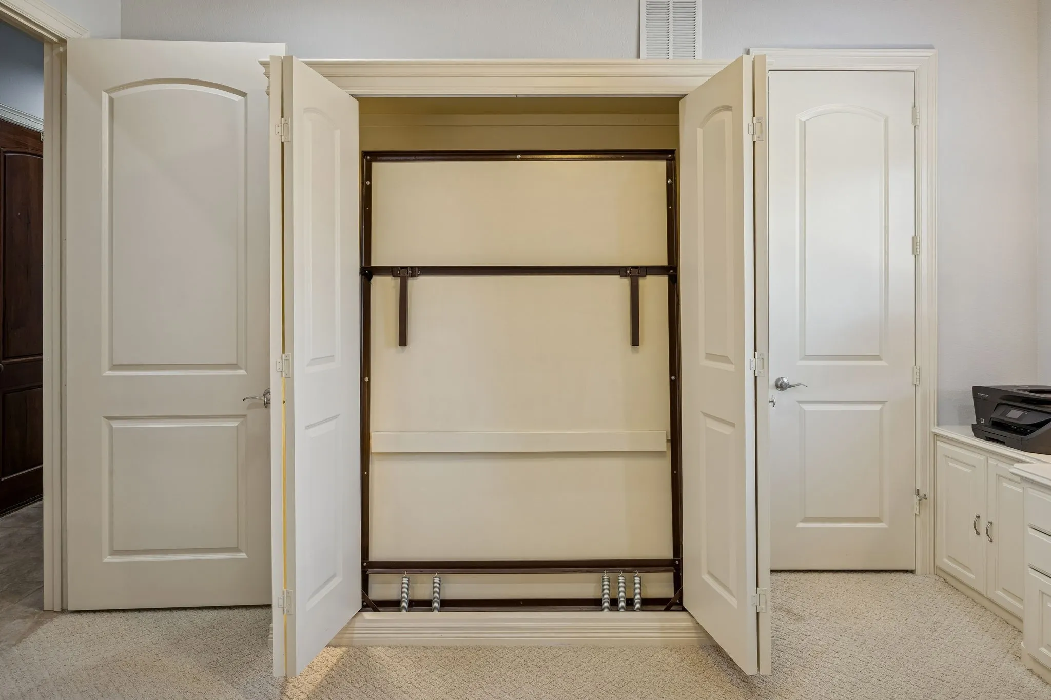 Murphy bed in the office. Door to the right is the walk in closet.
