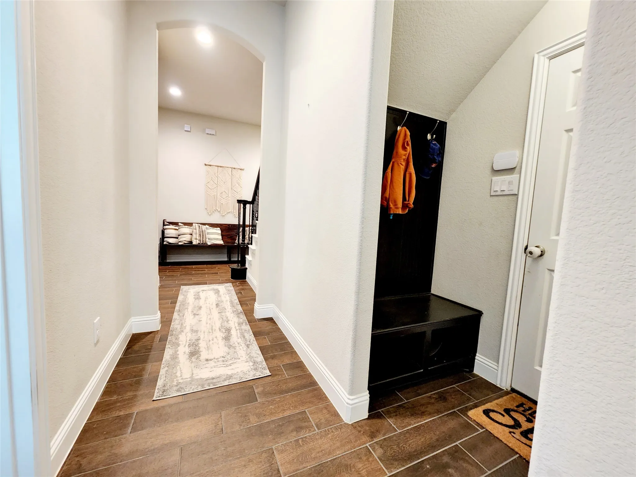 garage entry next to office and laundry room