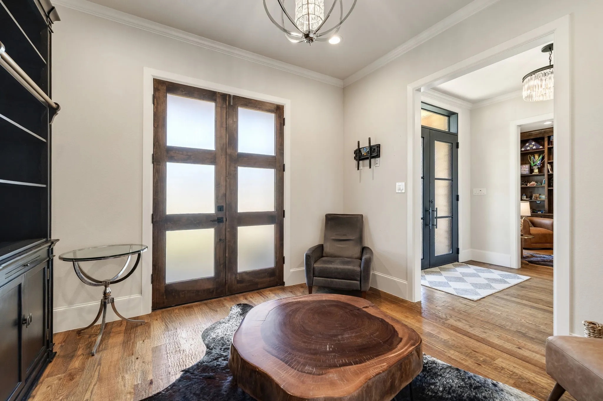 Flex room with double opening doors to the front of the home right off the entrance and a full walk-in-closet.