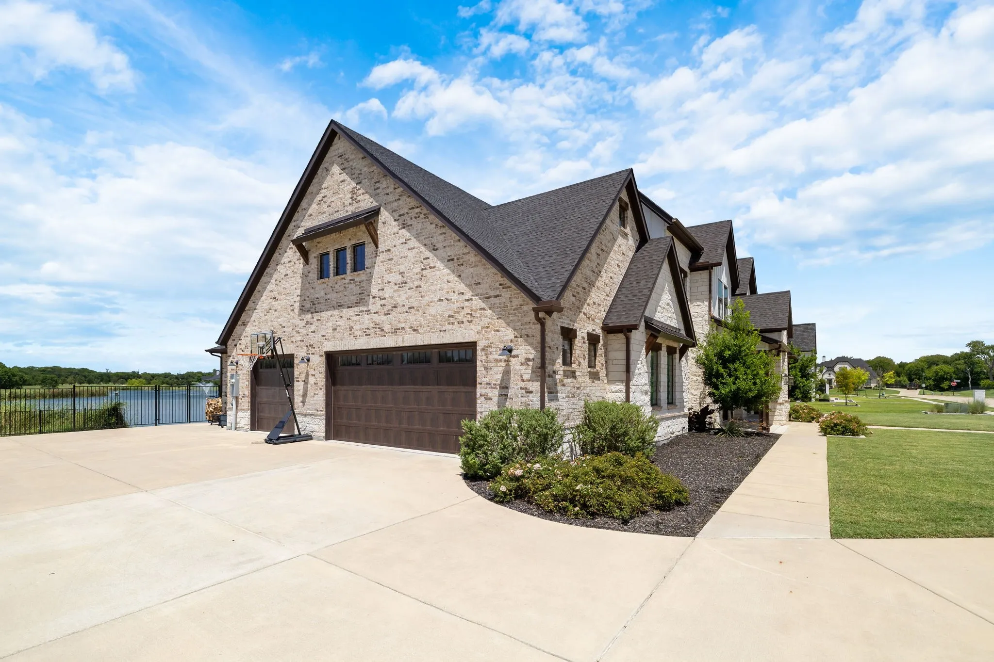 Brick and stone exterior with a multi-gabled roofline