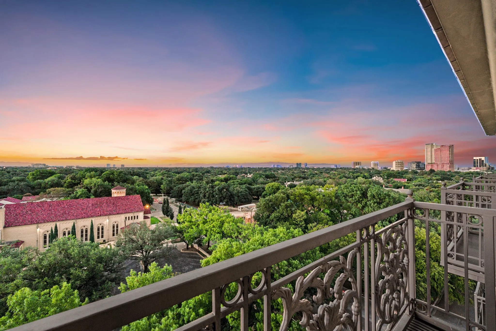 Private balcony with ornate metal railings