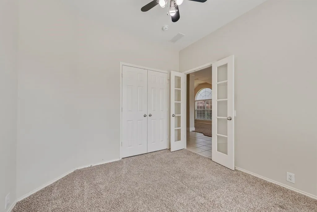 Bedroom room featuring French doors. Can be used as an office or guest bedroom