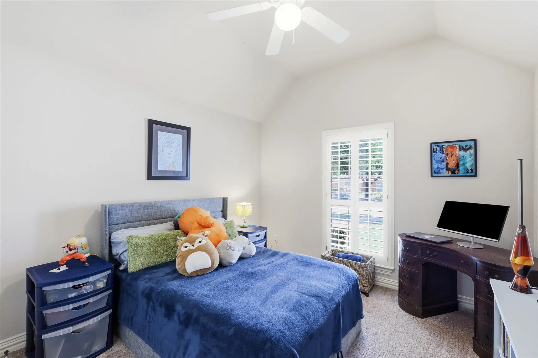 Bedroom 2 . Ceiling fan, plantation shutters, and loys of light