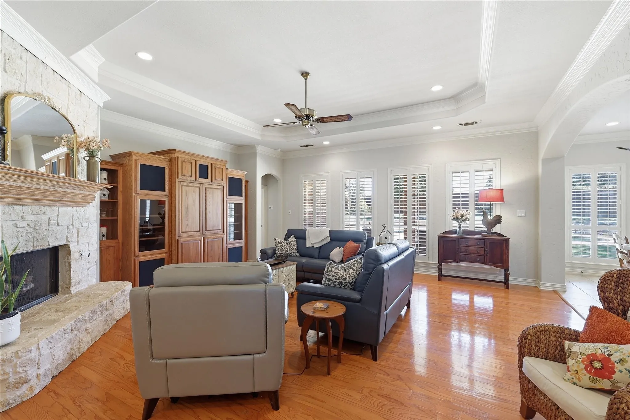 So many windows all with plantation shutters bringing the outside in.