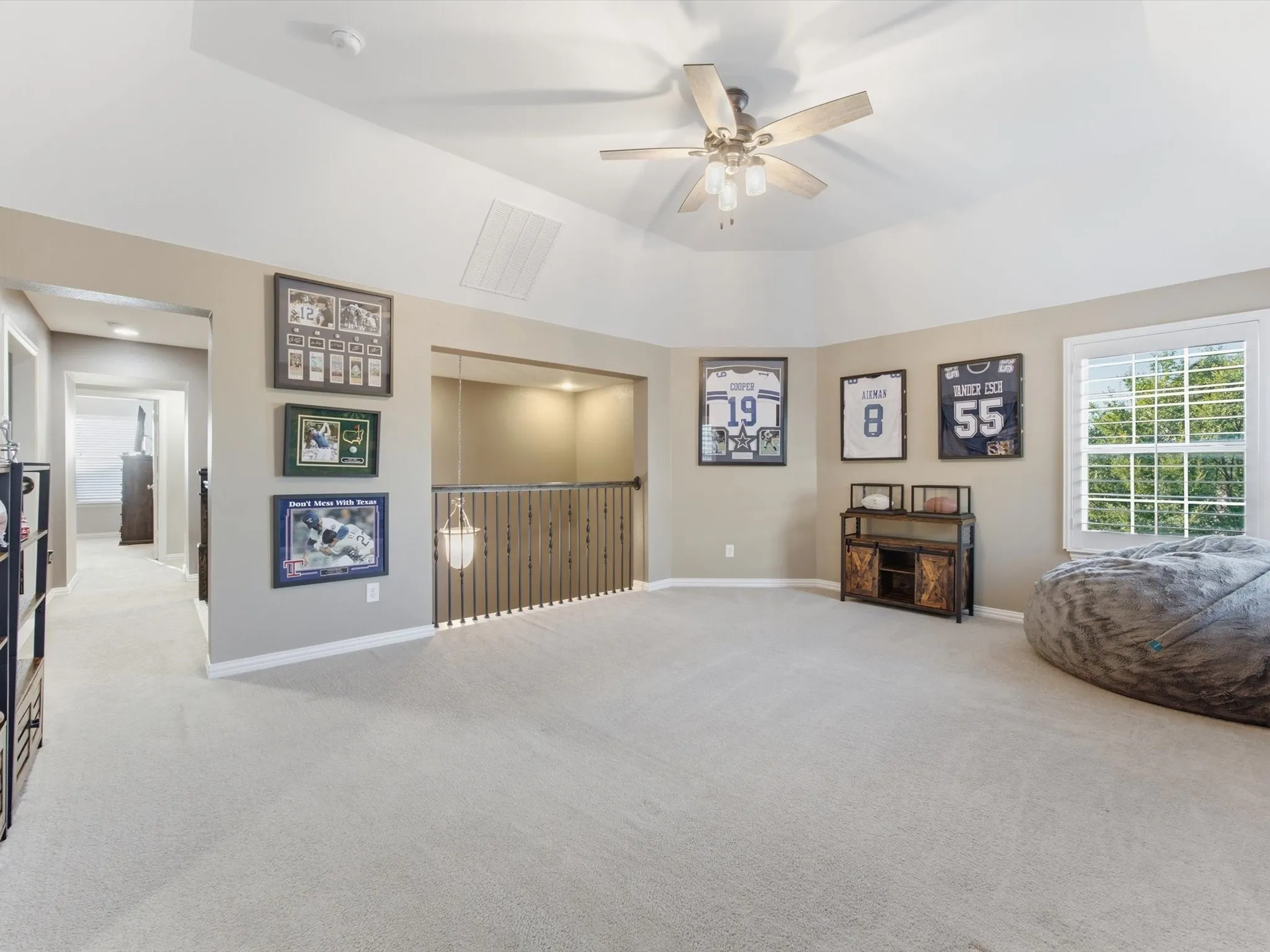 Spacious upstairs Game Room with carpet
