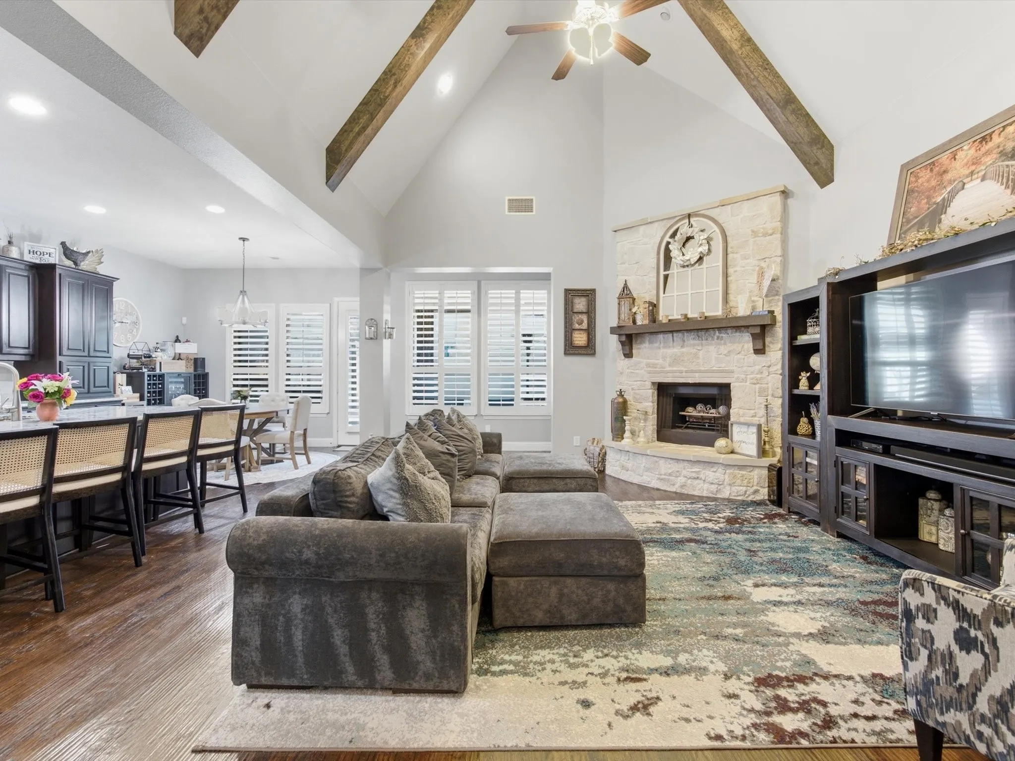 Vaulted ceiling with exposed wood-finish beams