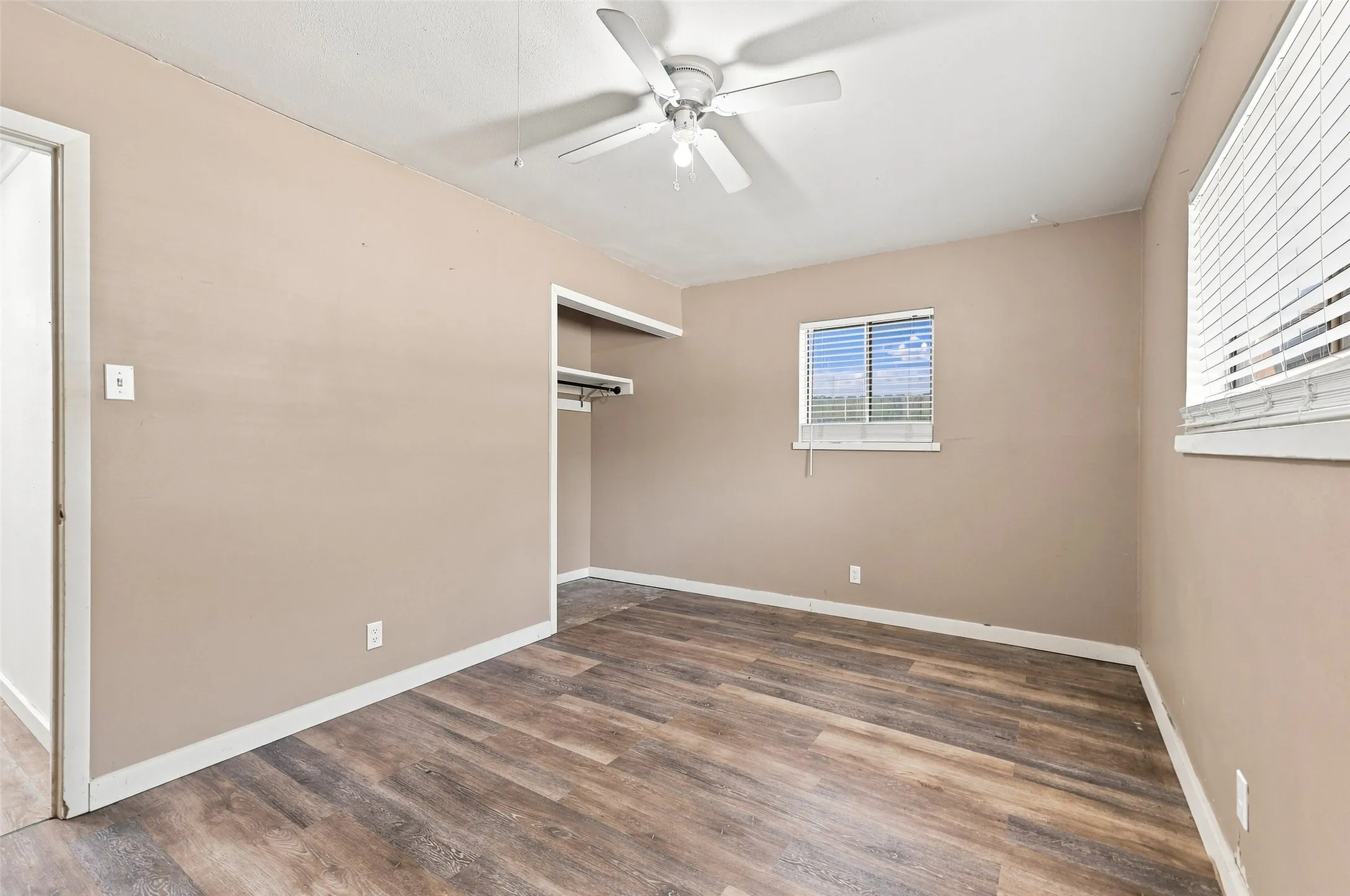Wood-finish flooring throughout