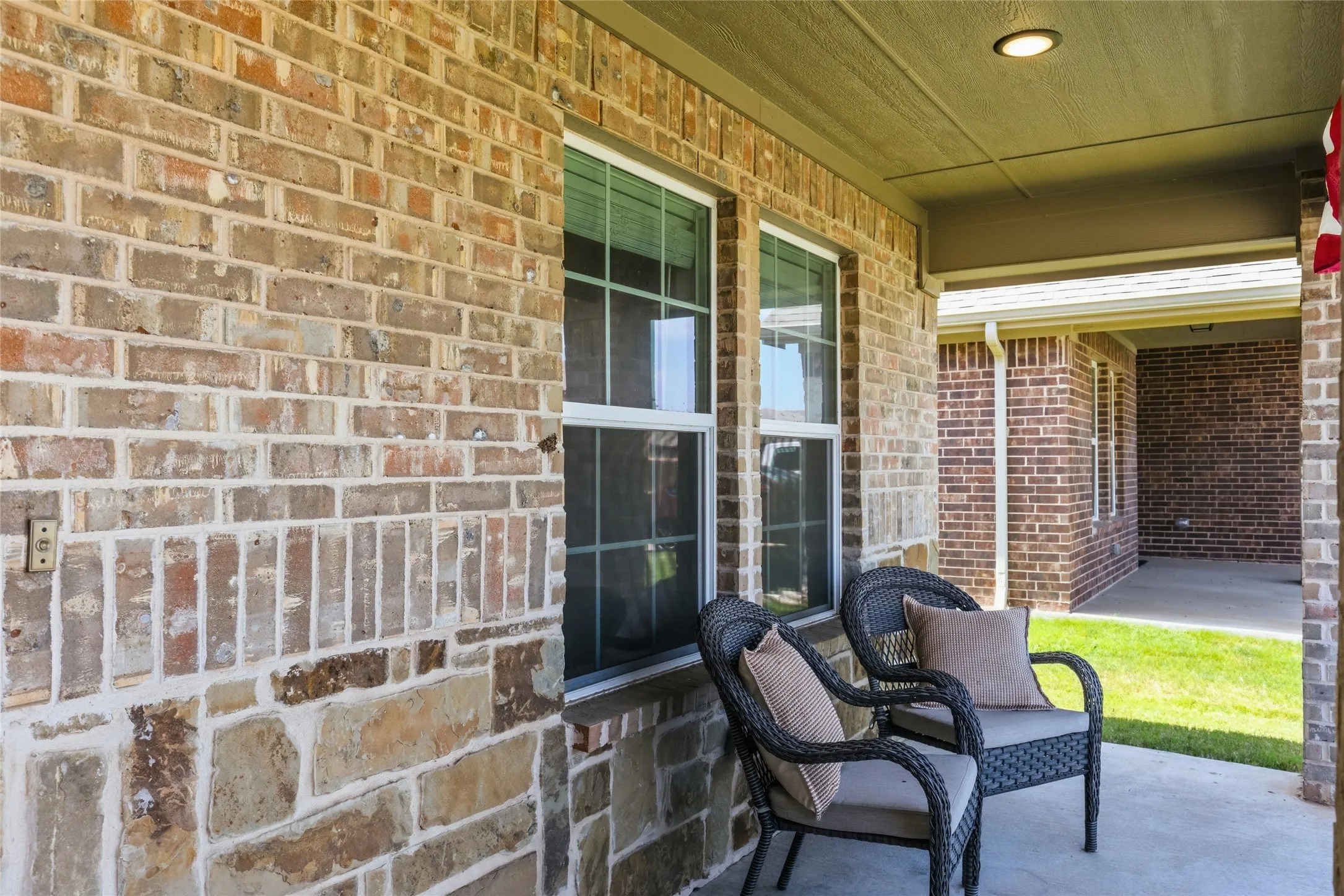 Covered porch with recessed lighting