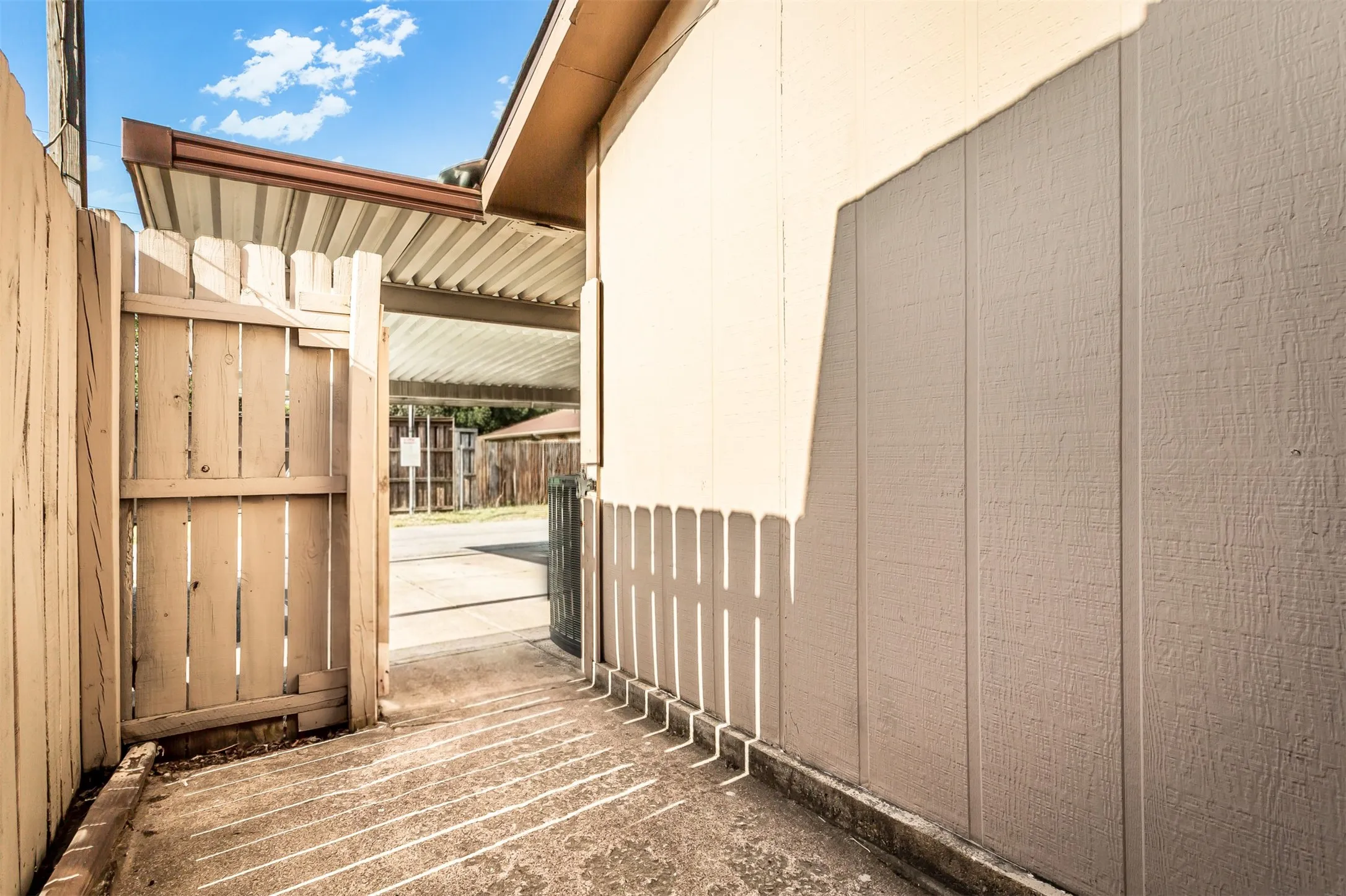 Back door entry offers convenient access to the covered two-car carport and one additional uncovered spot. Unit has a total of 3 parking spaces.