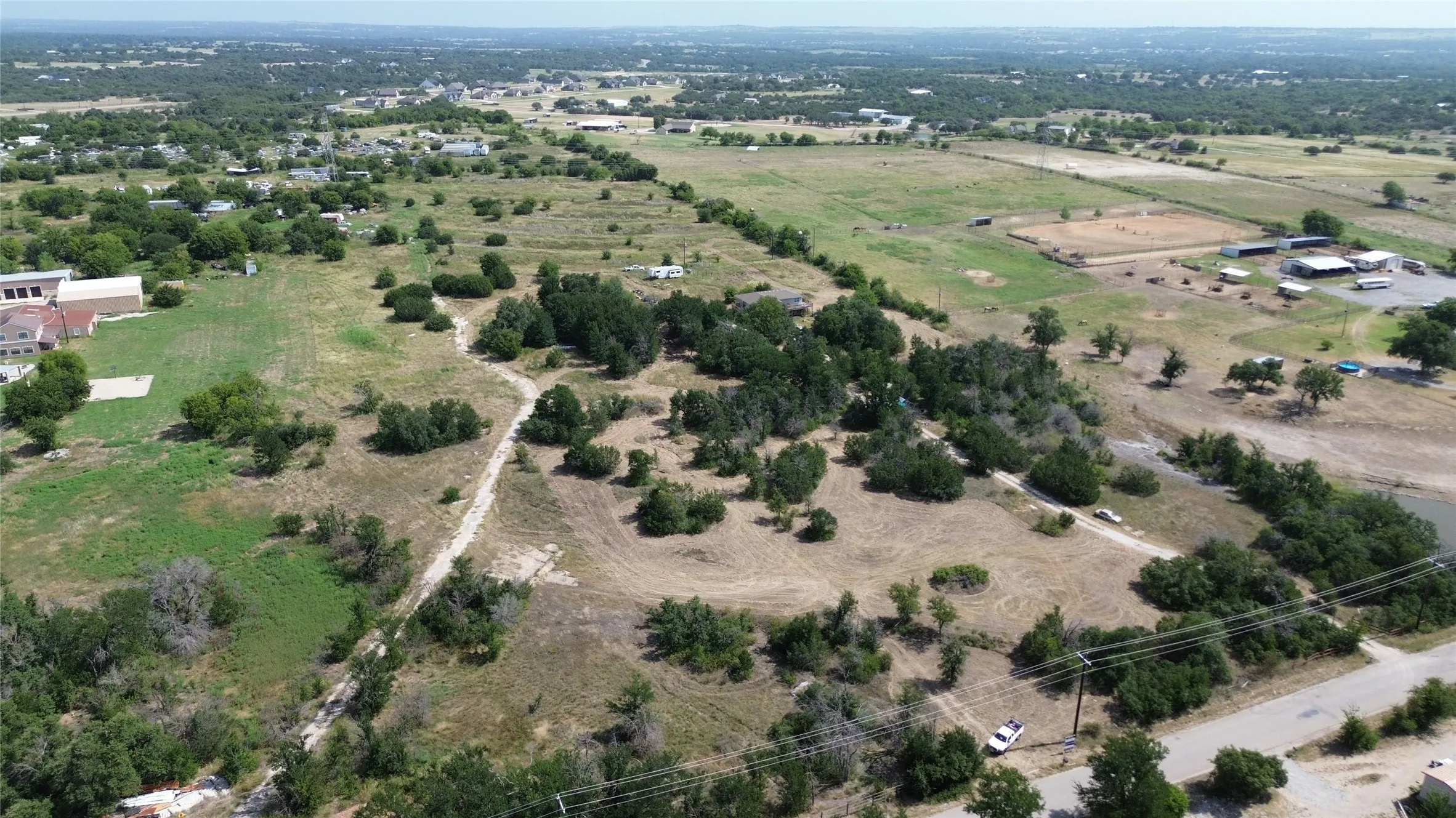 Expansive undeveloped land featuring mature trees and varied topography