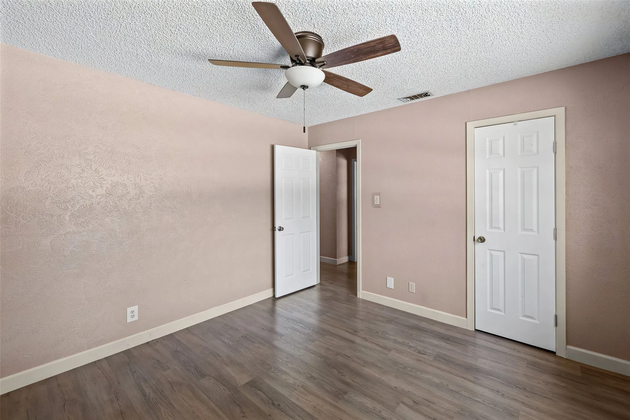 Ceiling fan and closet entry