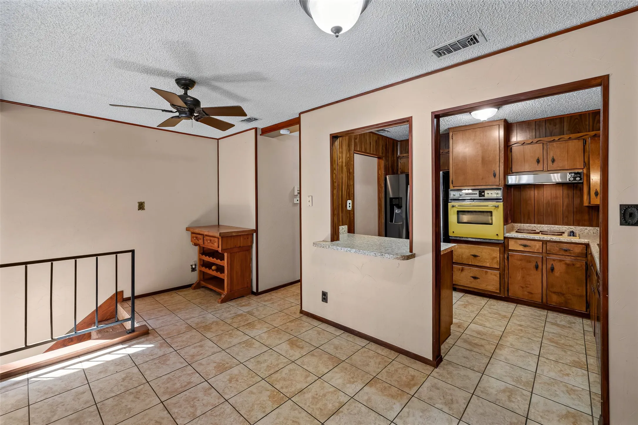 Dining area with ceiling fan