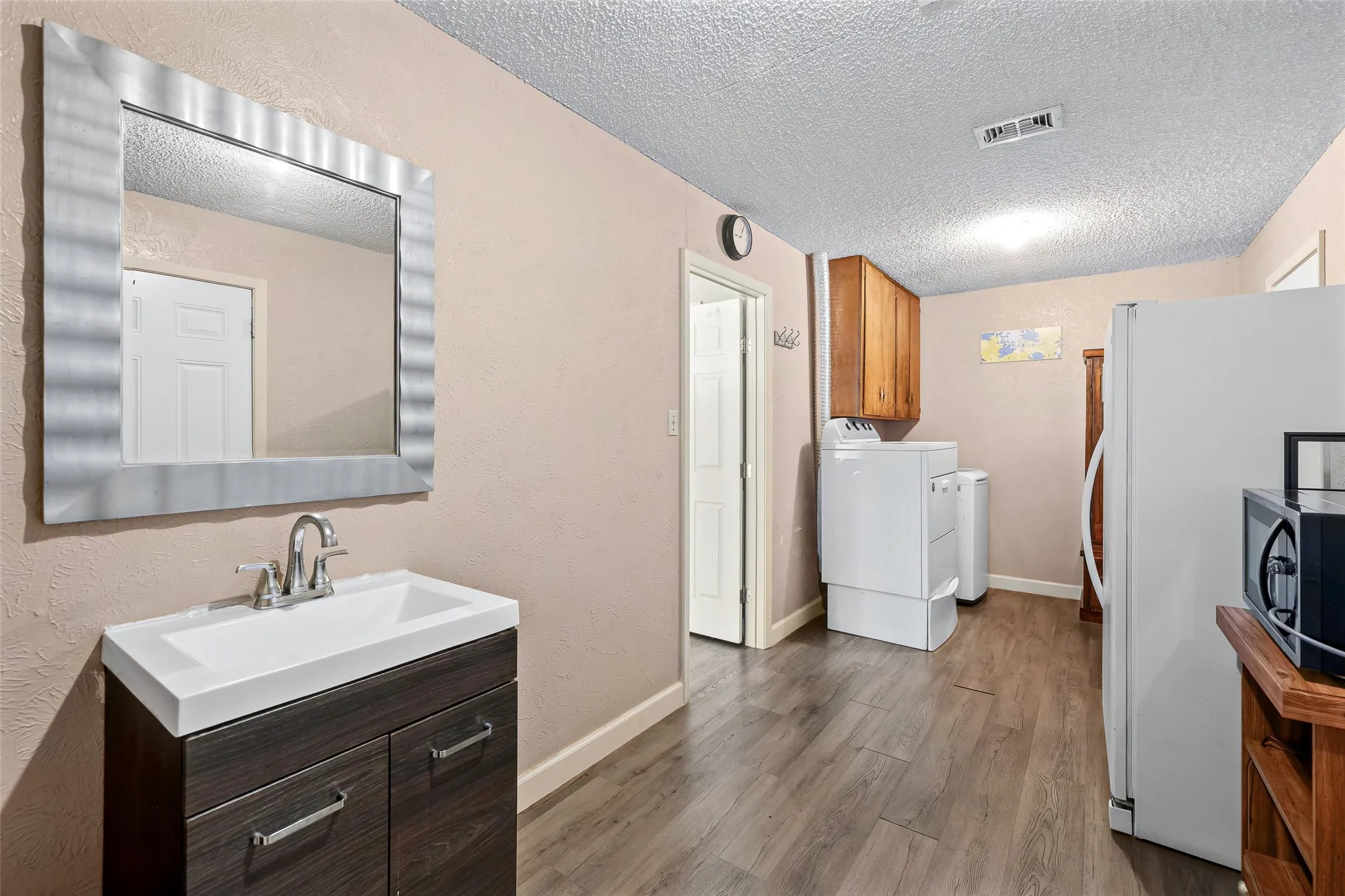 Utility with sink and room for other appliances