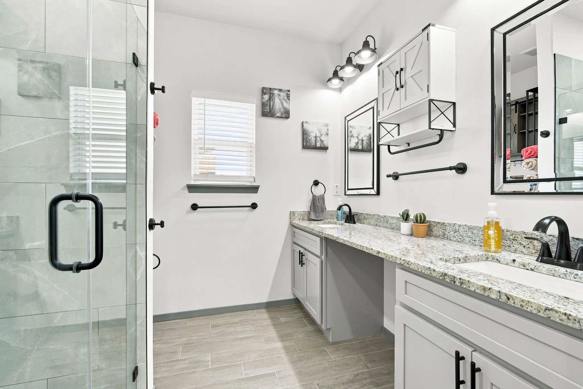 Well-appointed bathroom with a quartz vanity and generous counter space.