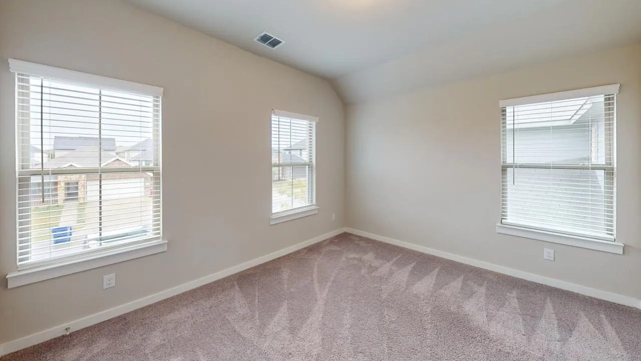 Neutral painted walls with white trim and baseboards