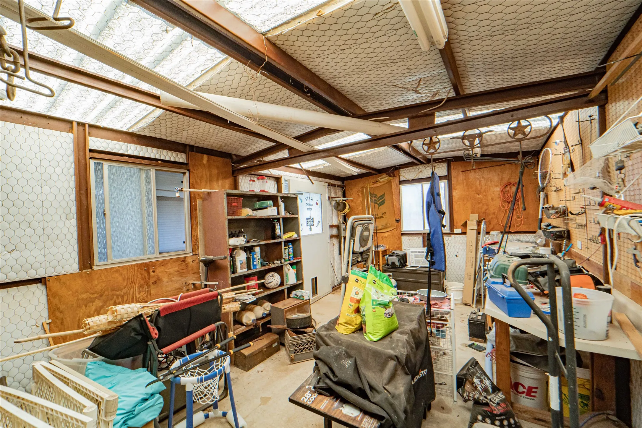 Storage room located off of covered patio, insulated and with electricity-