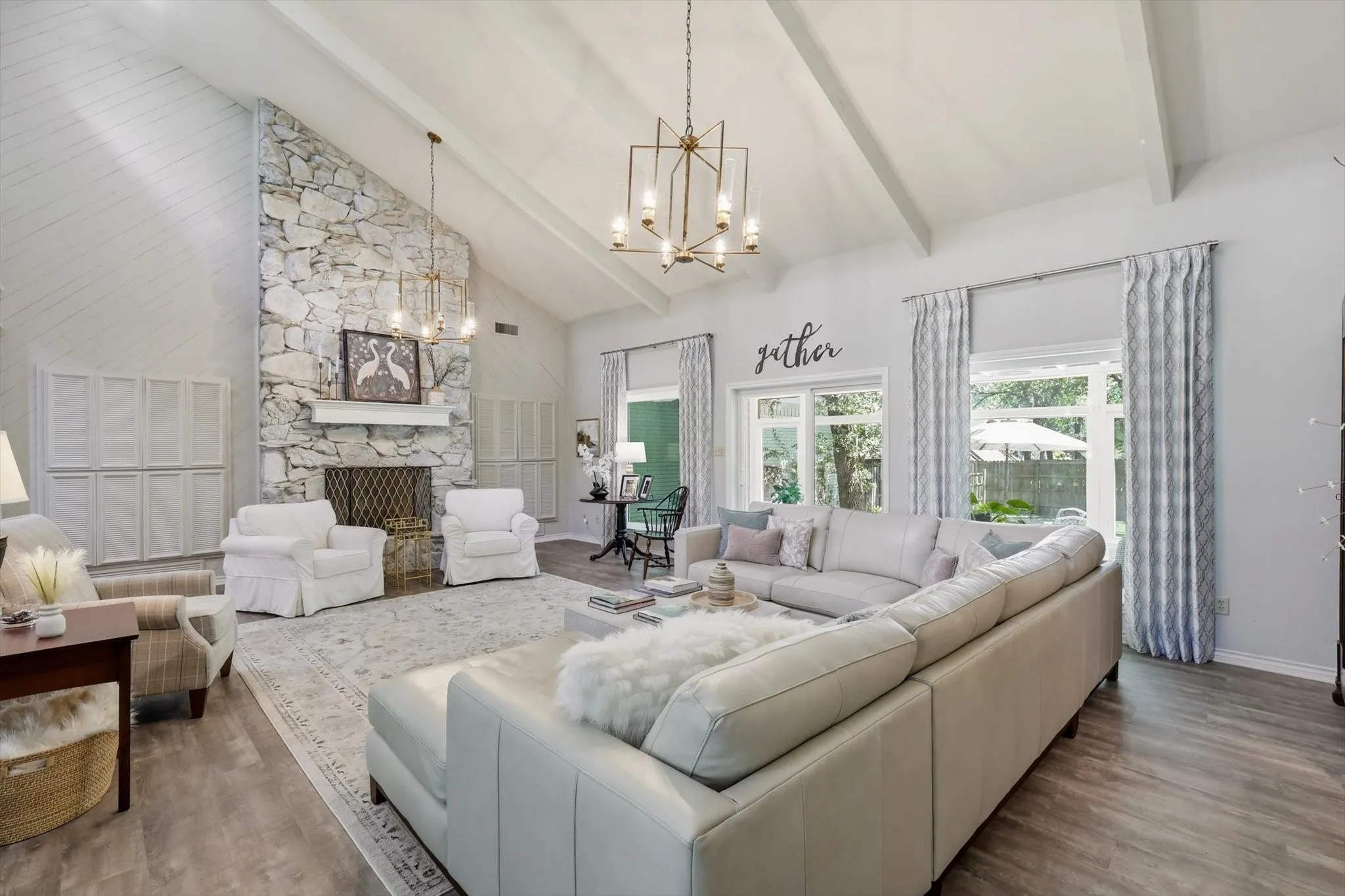 This large inviting living area with fireplace