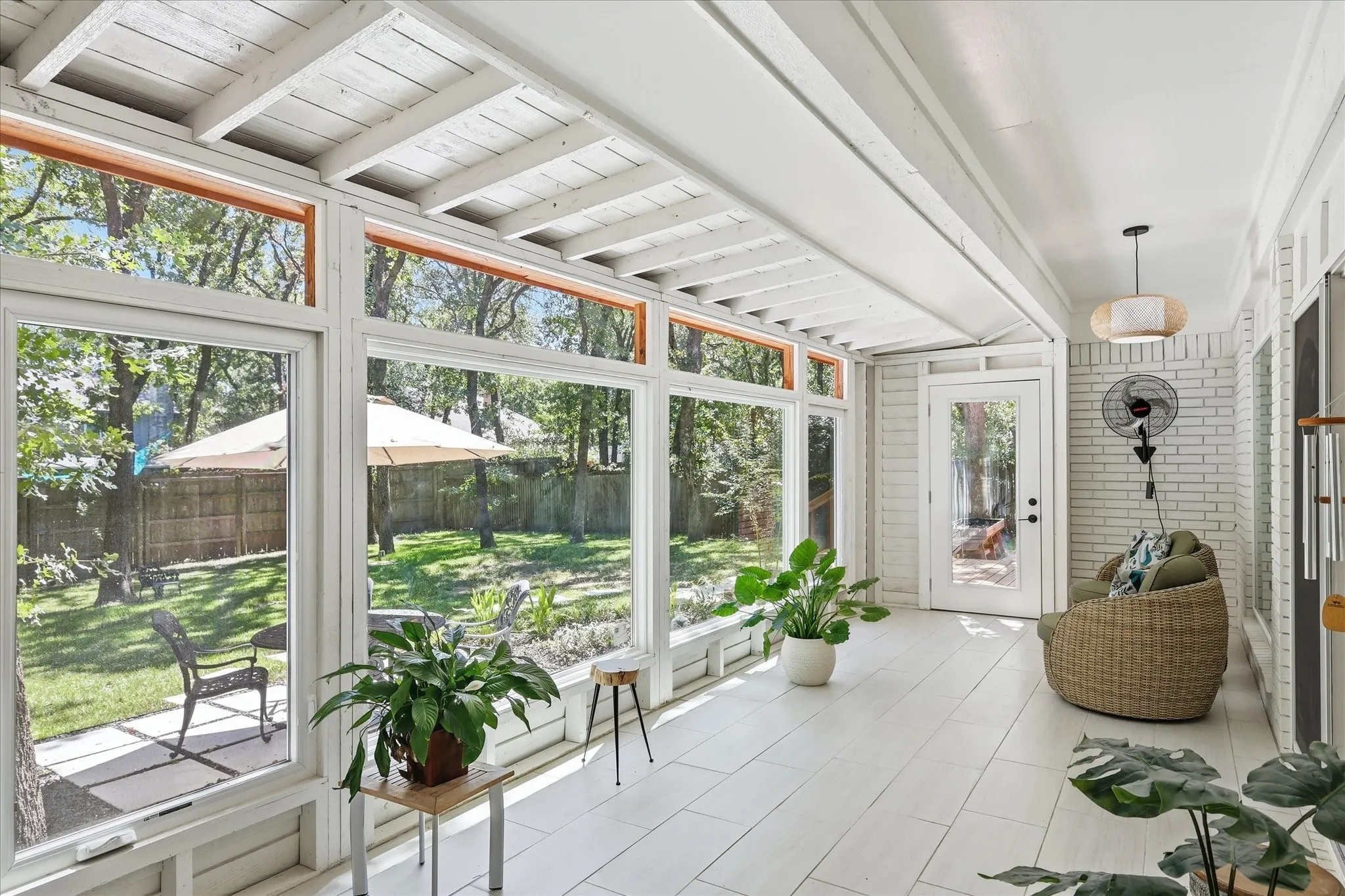 Recently added a beautiful Sunroom overlooks the backyard