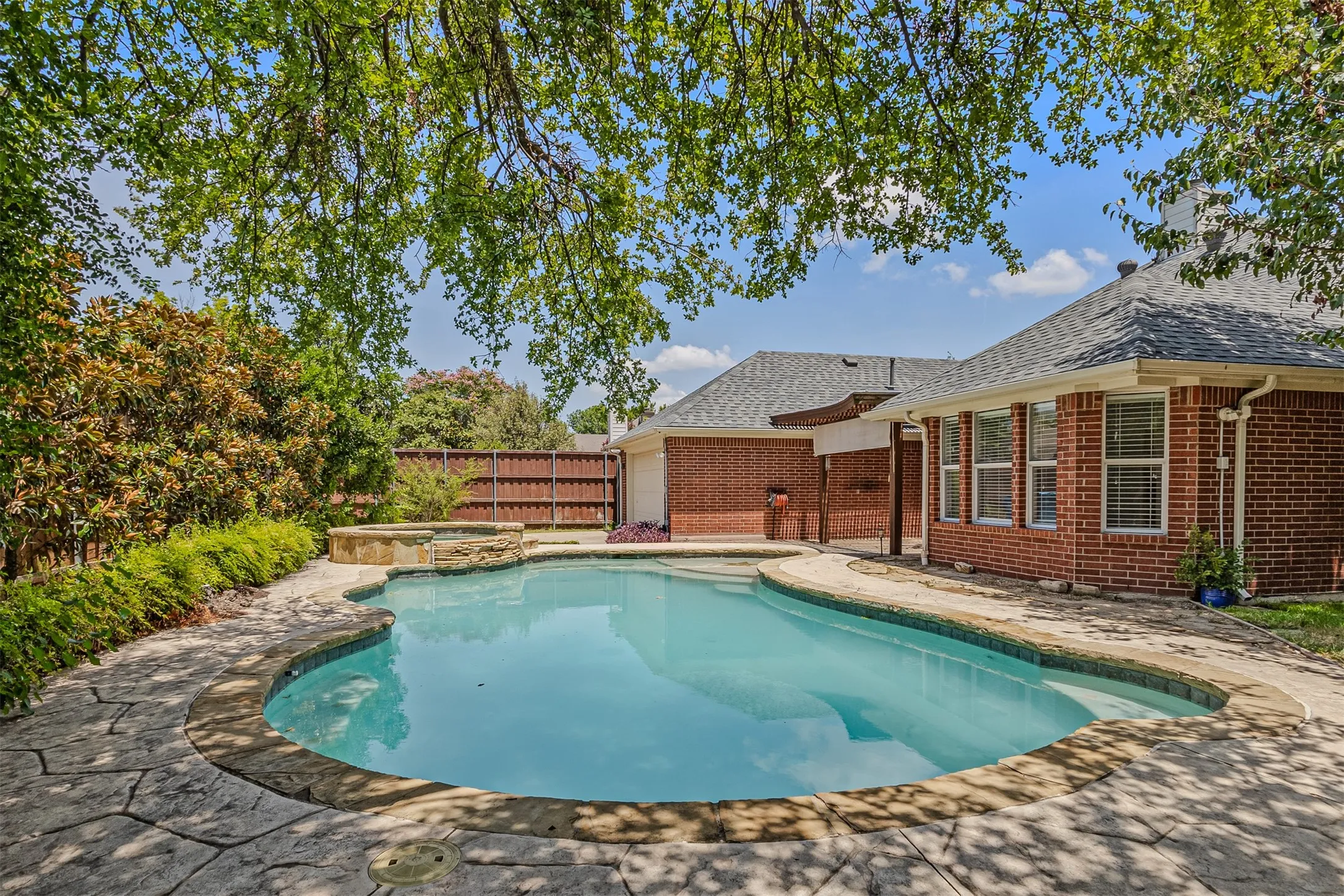 Gorgeous backyard with pool and heated spa