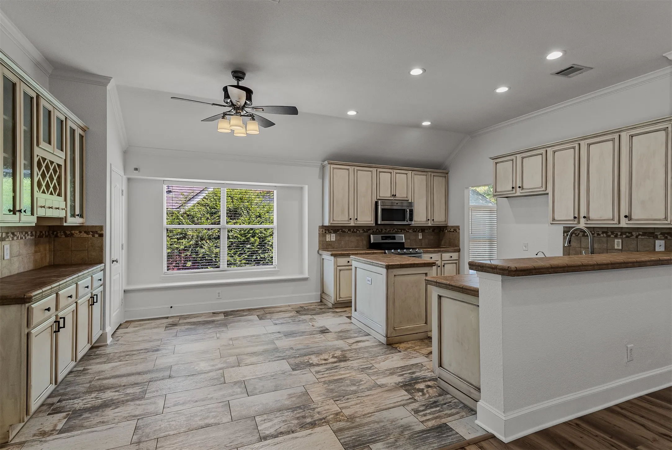 Living area opens to huge kitchen with breakfast room and a built in butlers panty