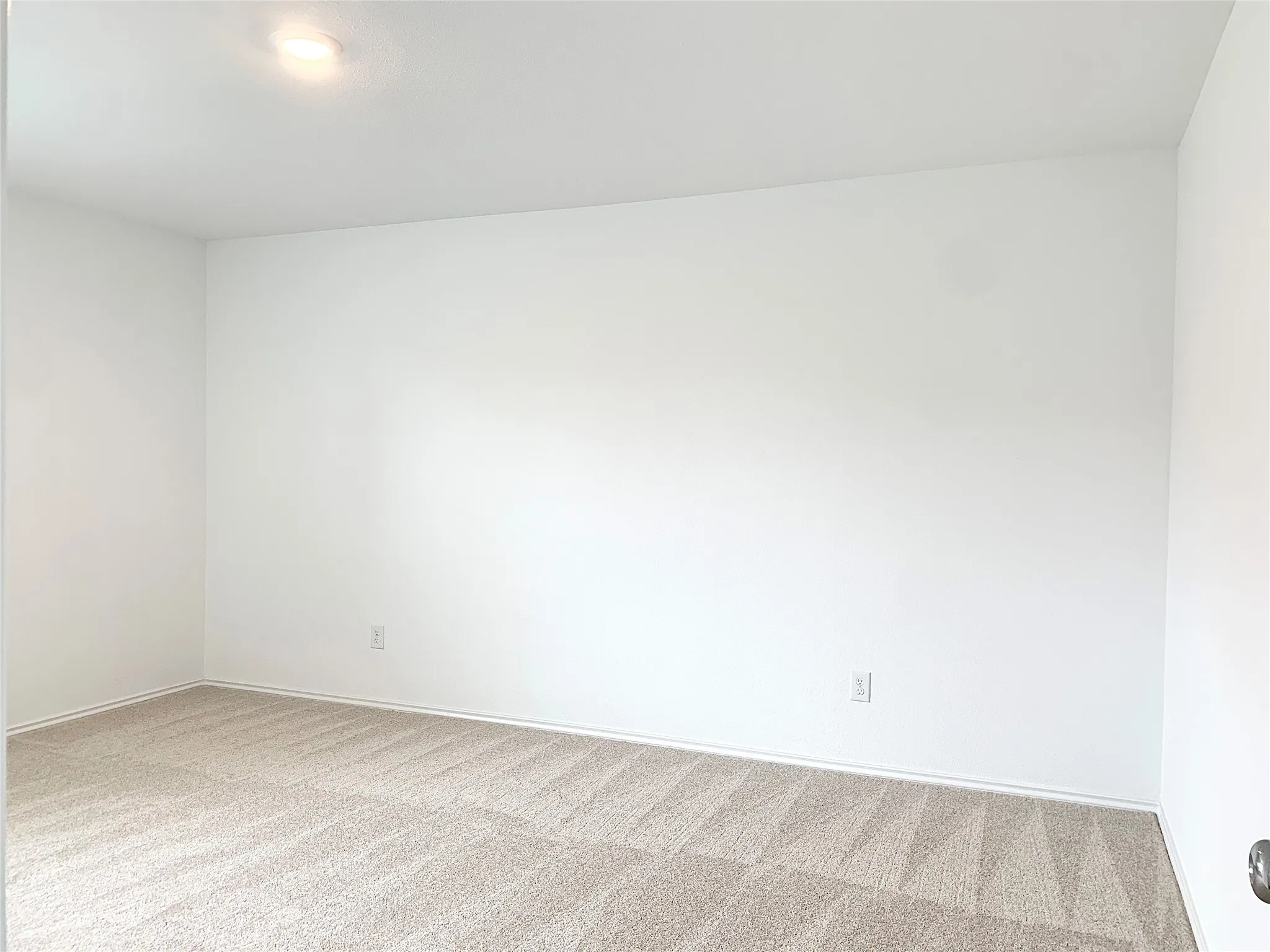 Primary bedroom with plenty of natural light