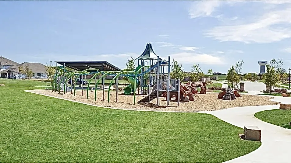 Communal playground featuring a lawn
