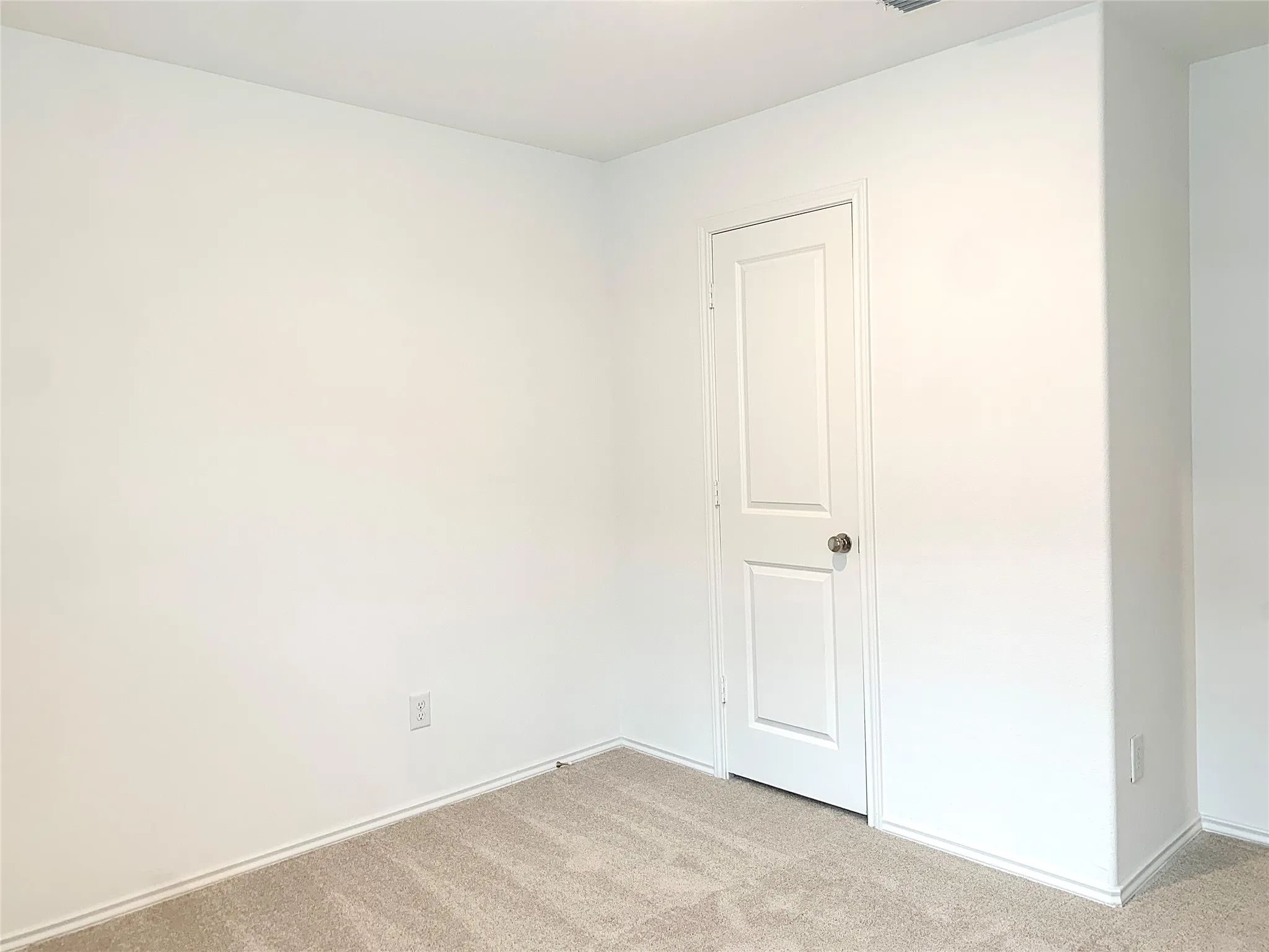 3rd bedroom with carpet flooring