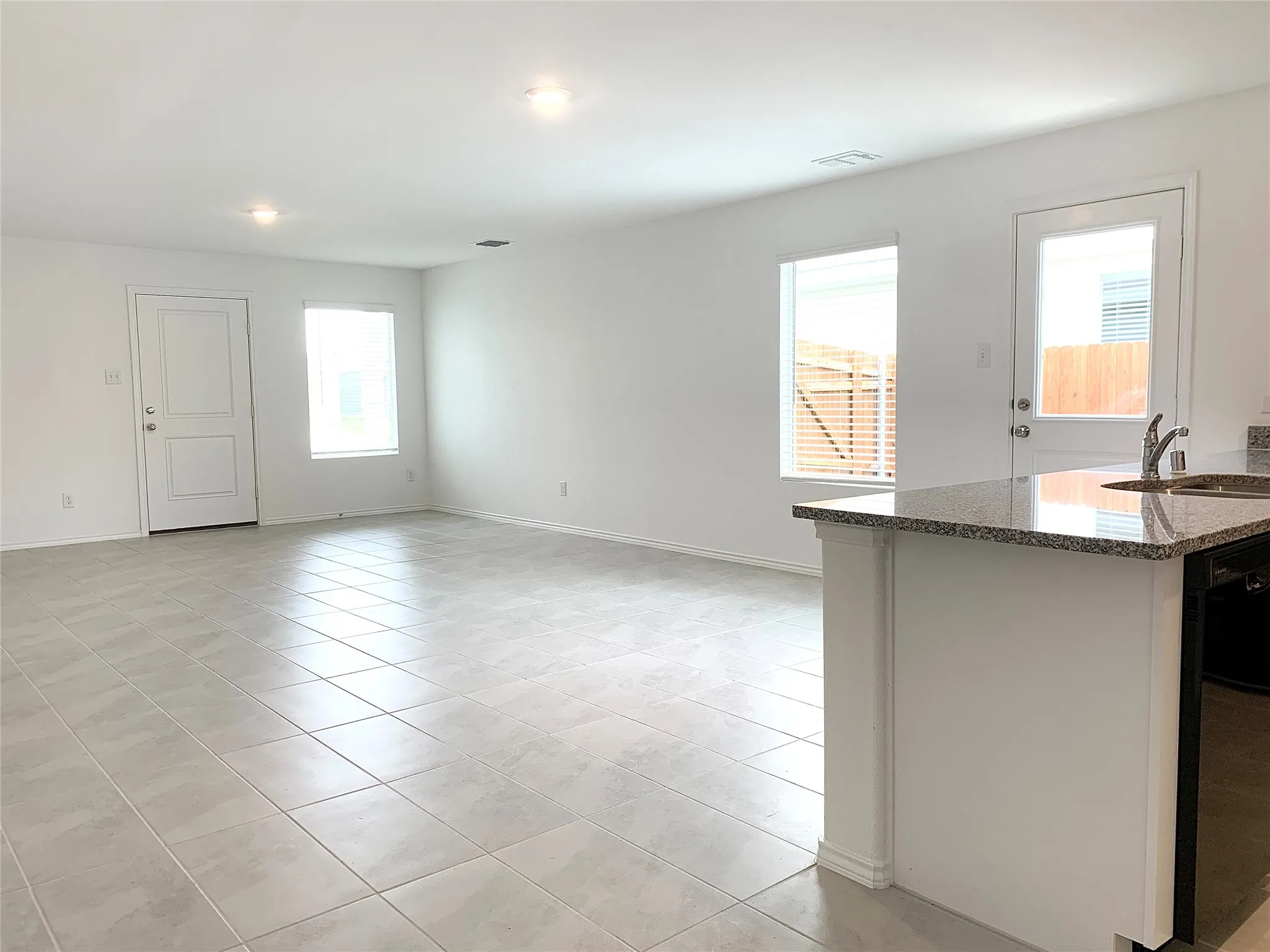 Open floor plan living room with plenty of natural light