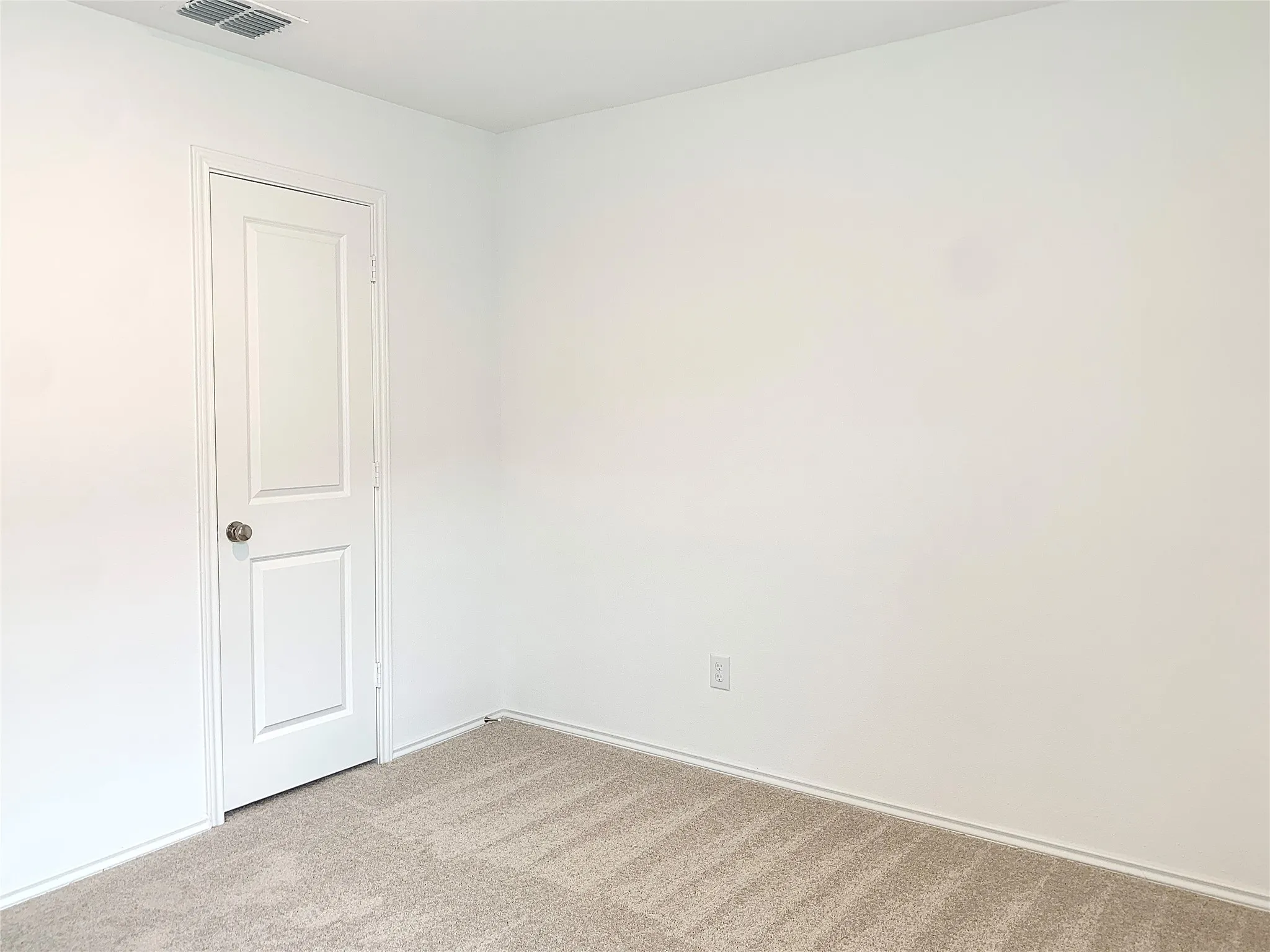 2nd bedroom featuring carpet