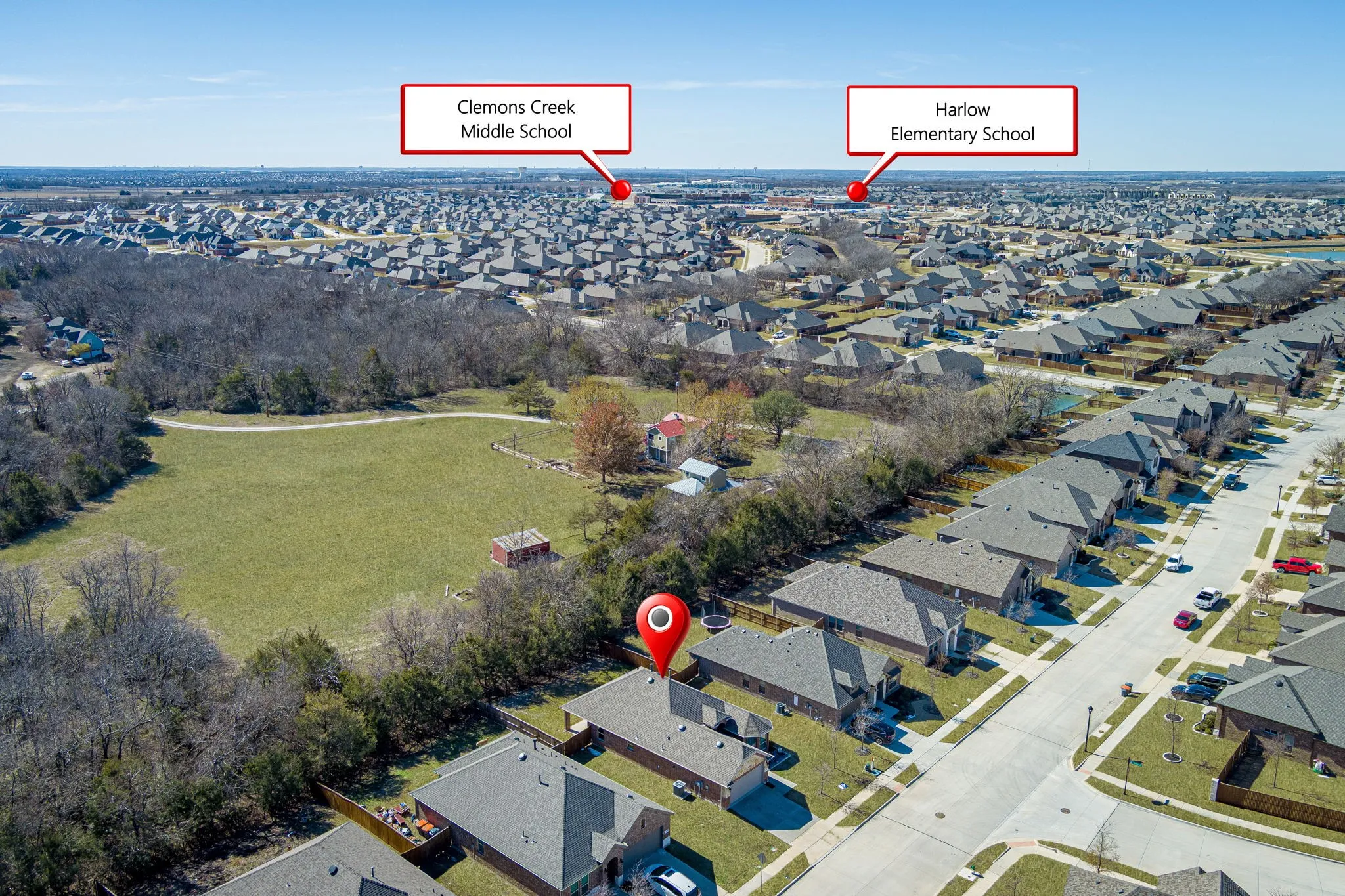View of property location featuring nearby suburban area