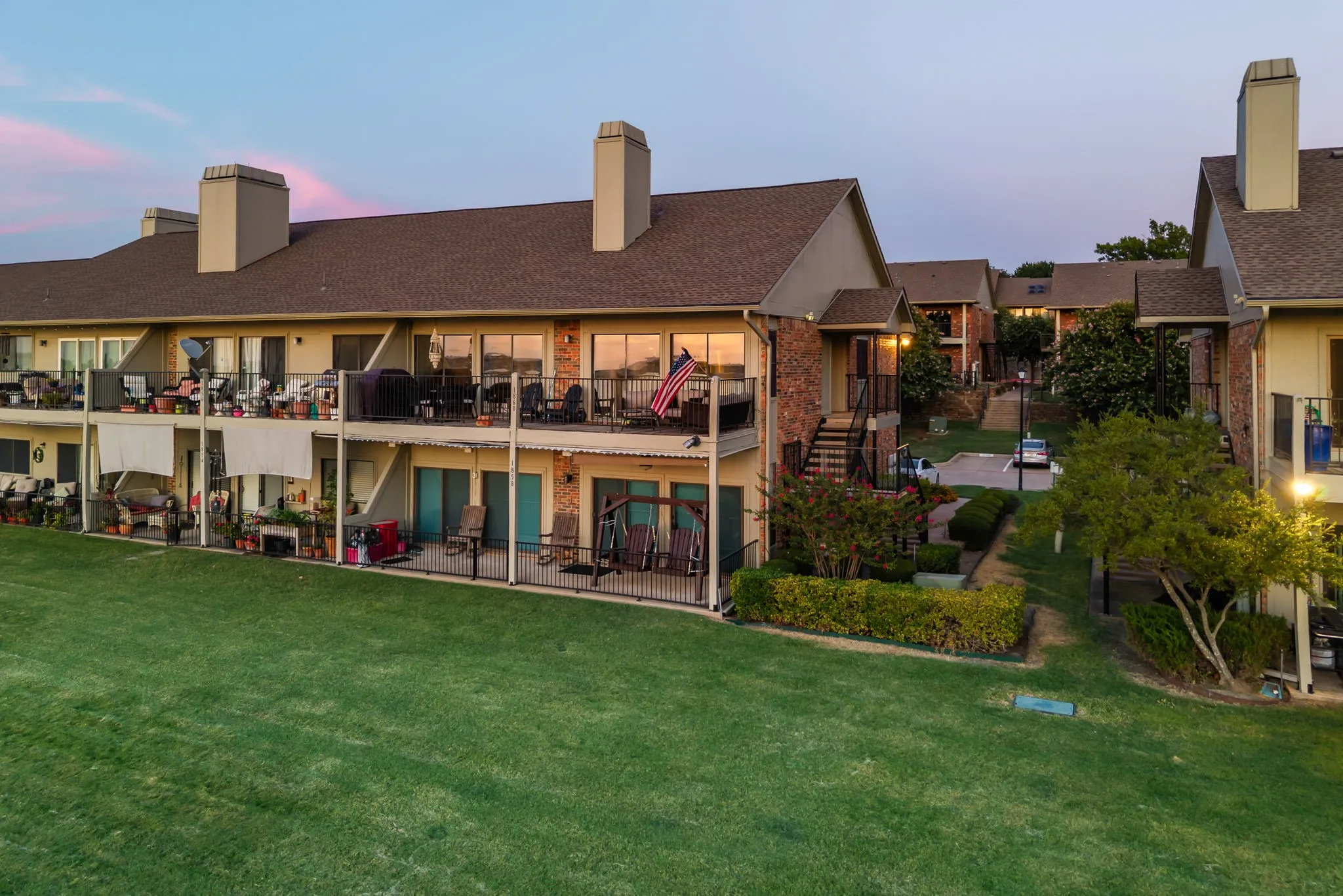 Multi-level residence featuring private balconies and patios