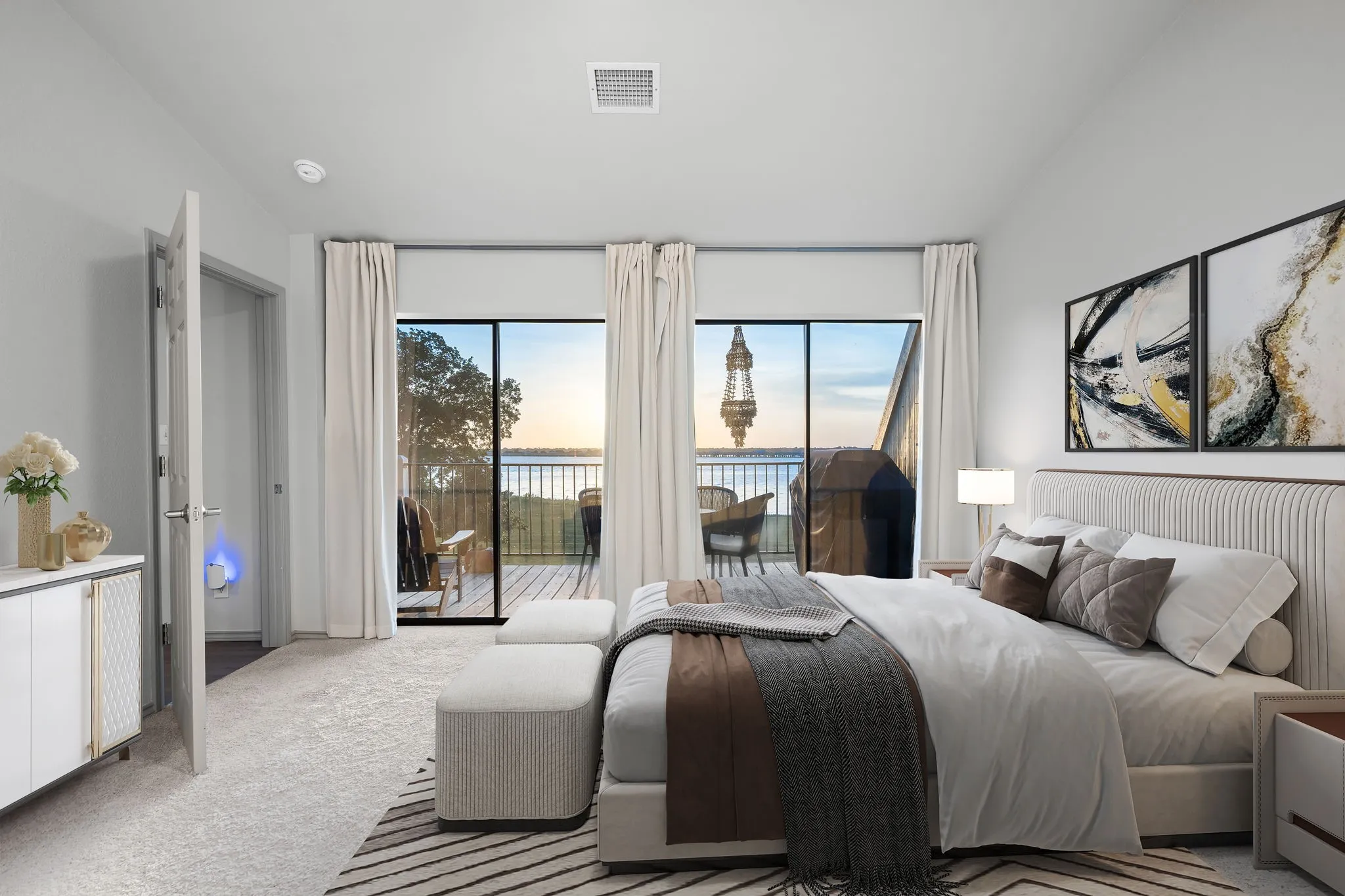 Spectacular view of the lake from the primary bedroom and access to the patio