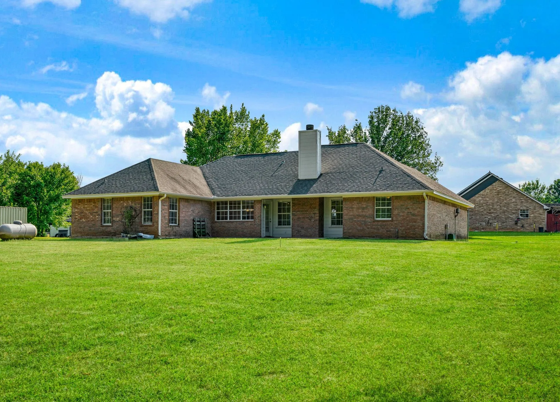 Spacious rear yard with a well-maintained lawn