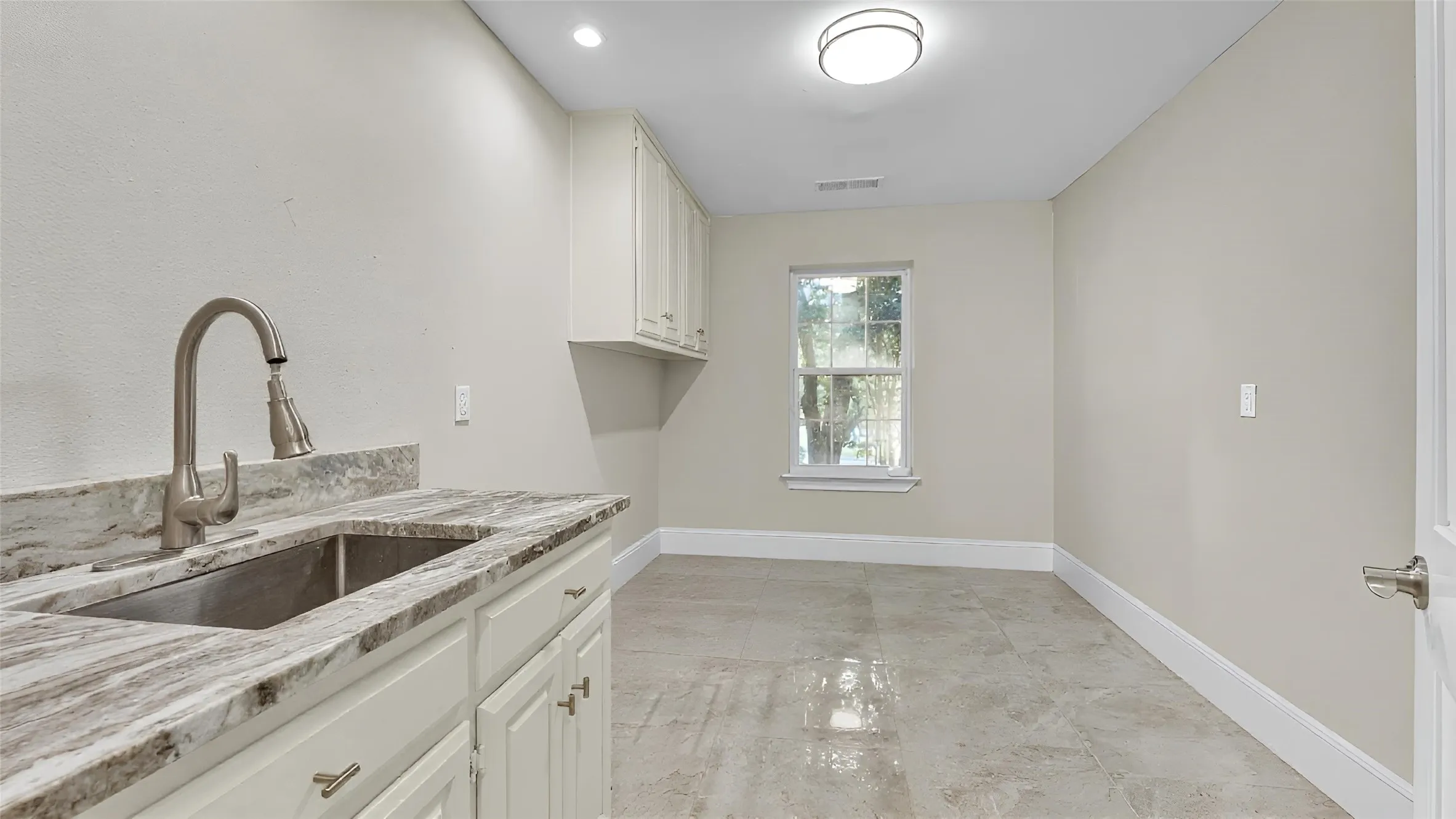Laundry Room with Utility Sink