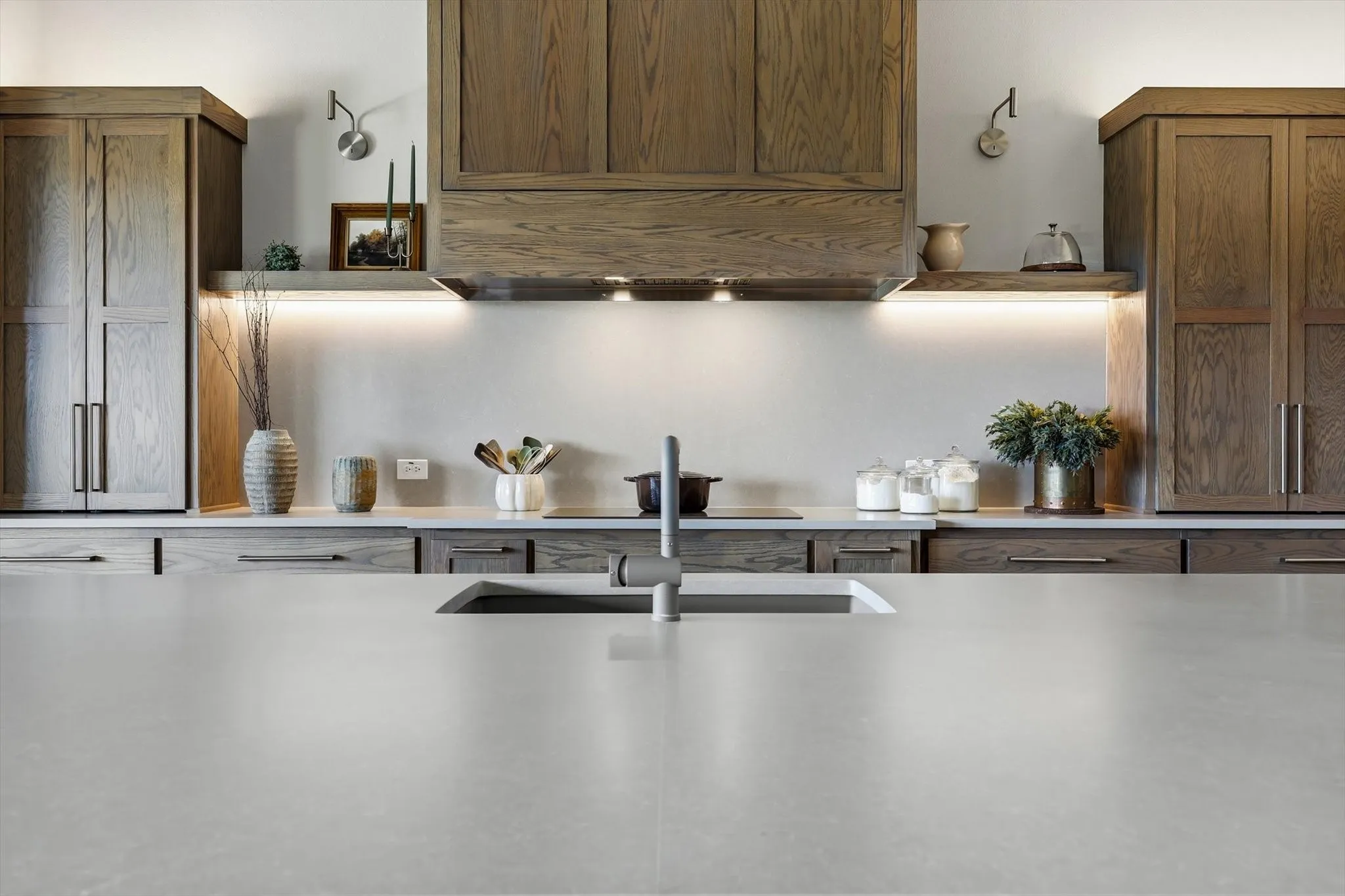 Matching granite faucet and undermounted single basin kitchen sink