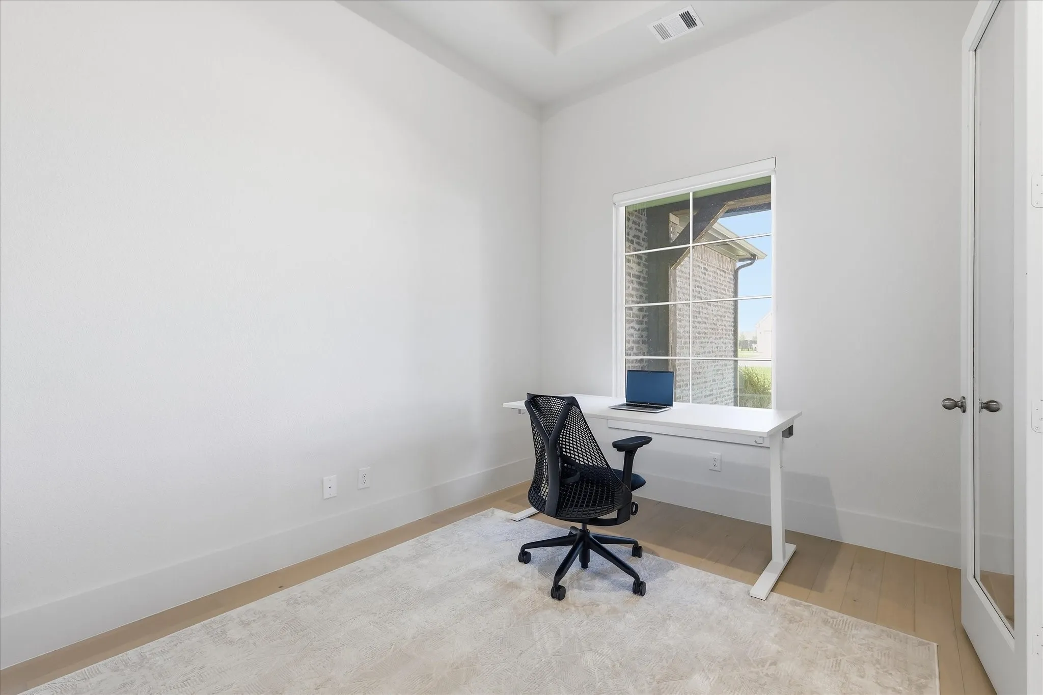 Large office overlooks the front covered patio and has a floor plug. CAT5E throughout entire home.
