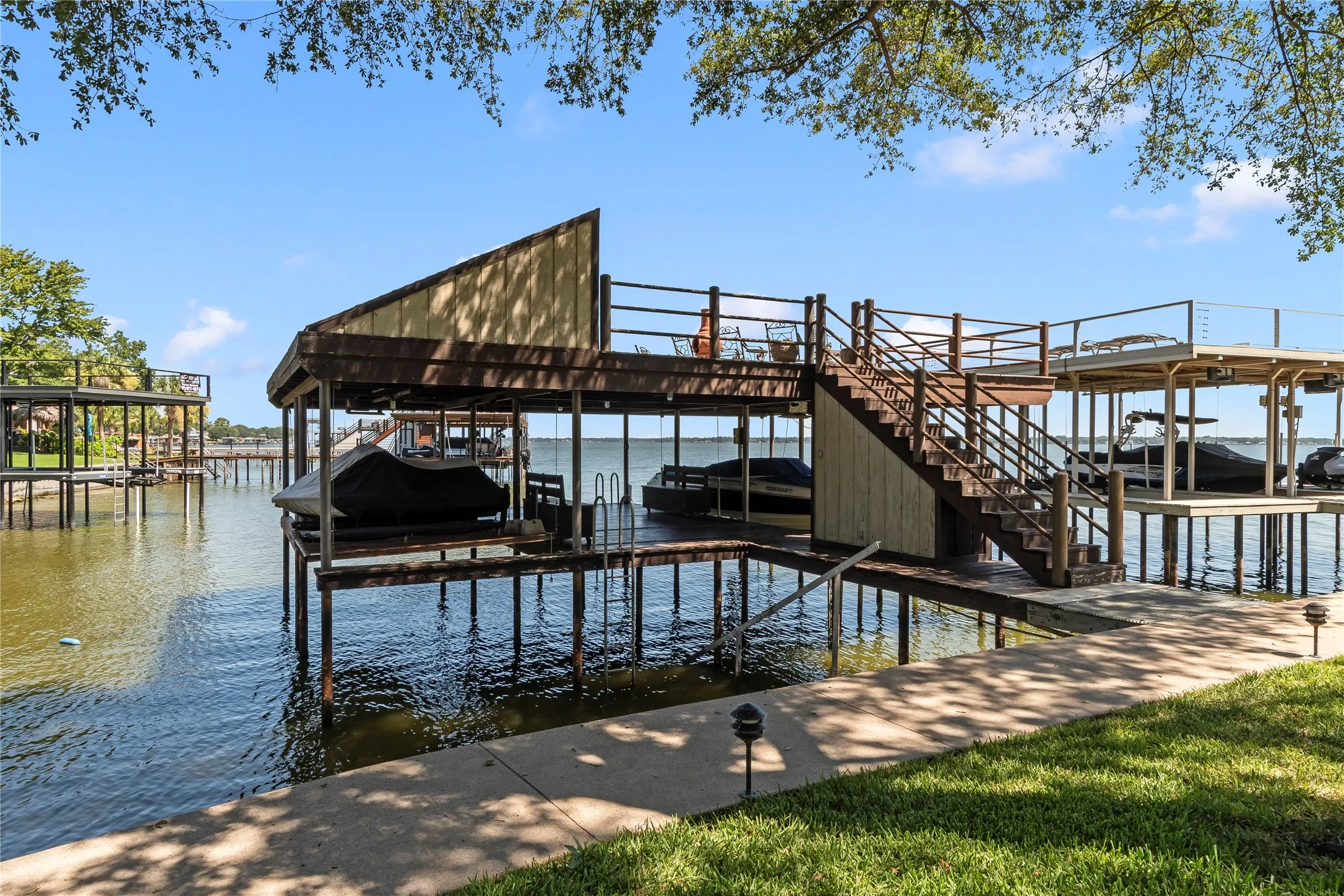Boathouse located on protected cover just off open water with wonderful views.