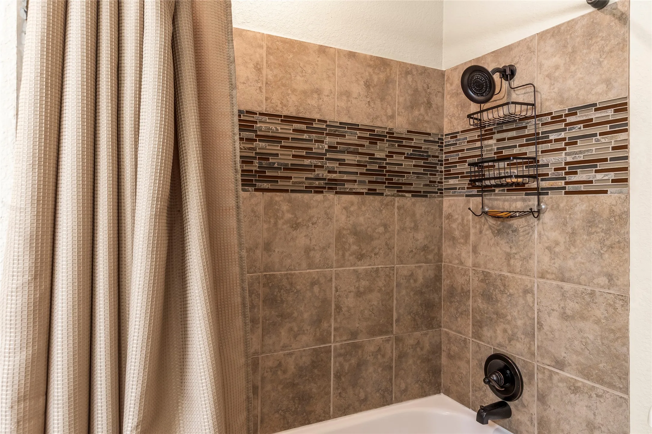 Guest bathrooms tile shower