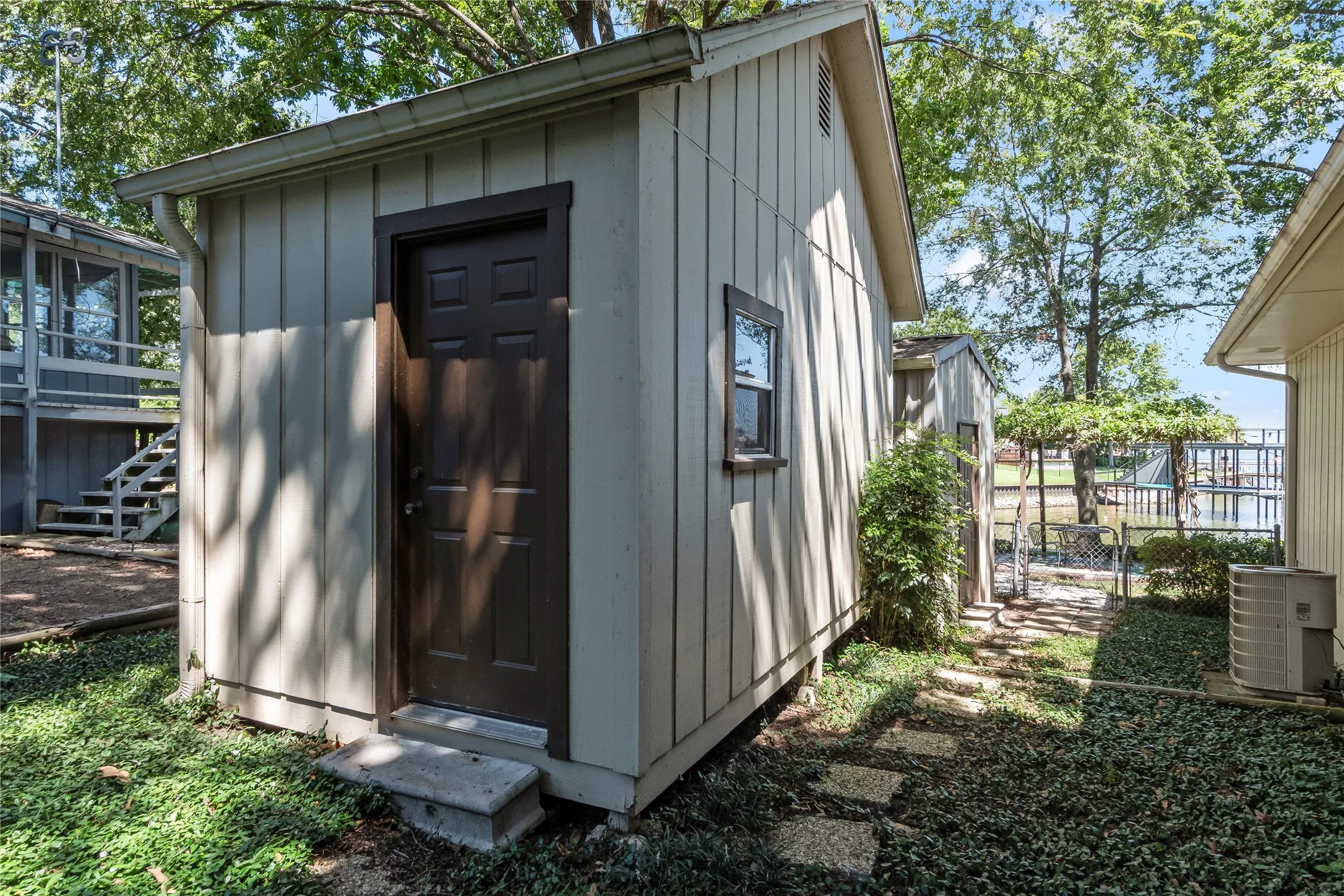 Detached guest quarters provides additional sleeping.