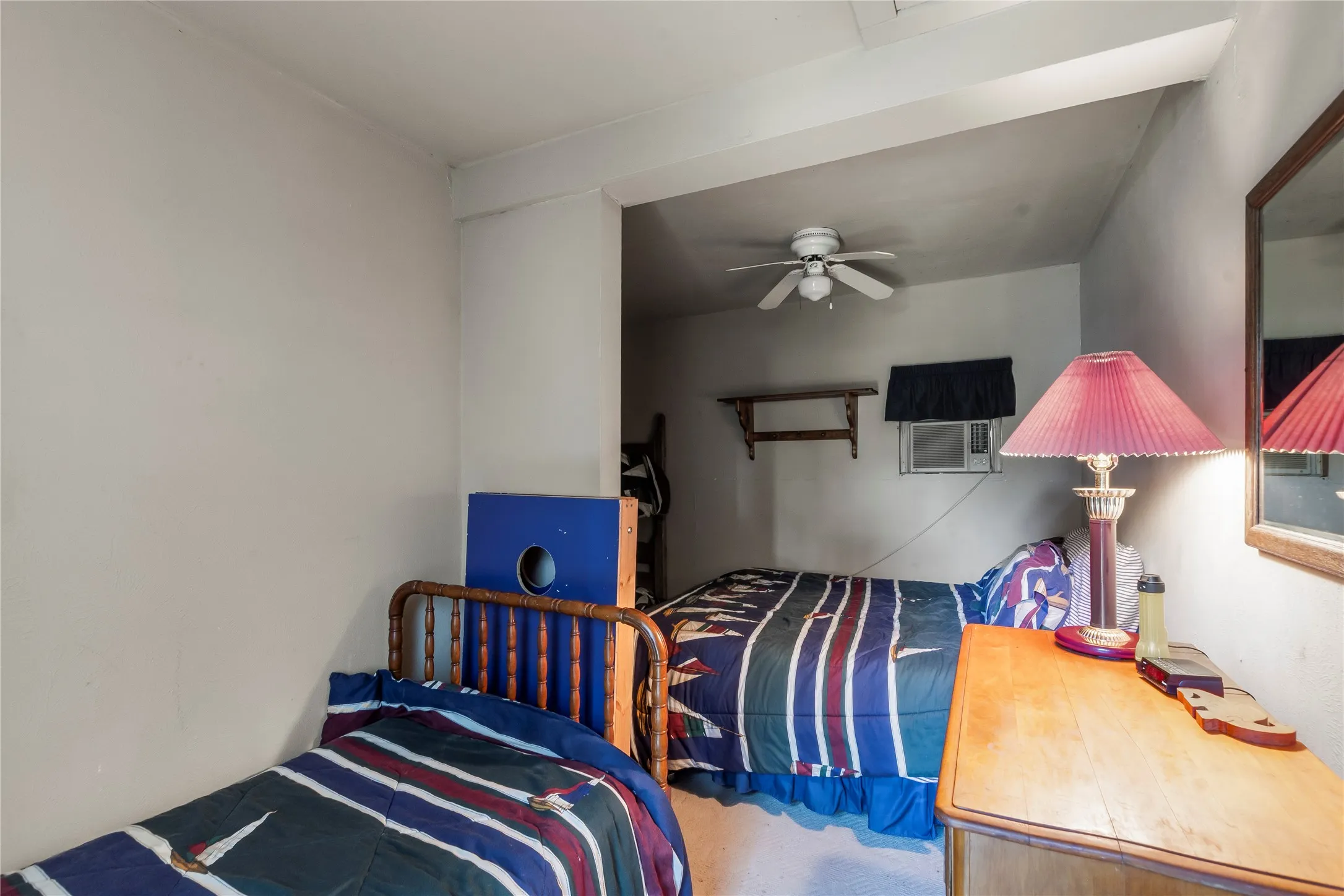Detached guest quarters provides fourth bedroom with a twin bed, full bed, and twin bunk beds.