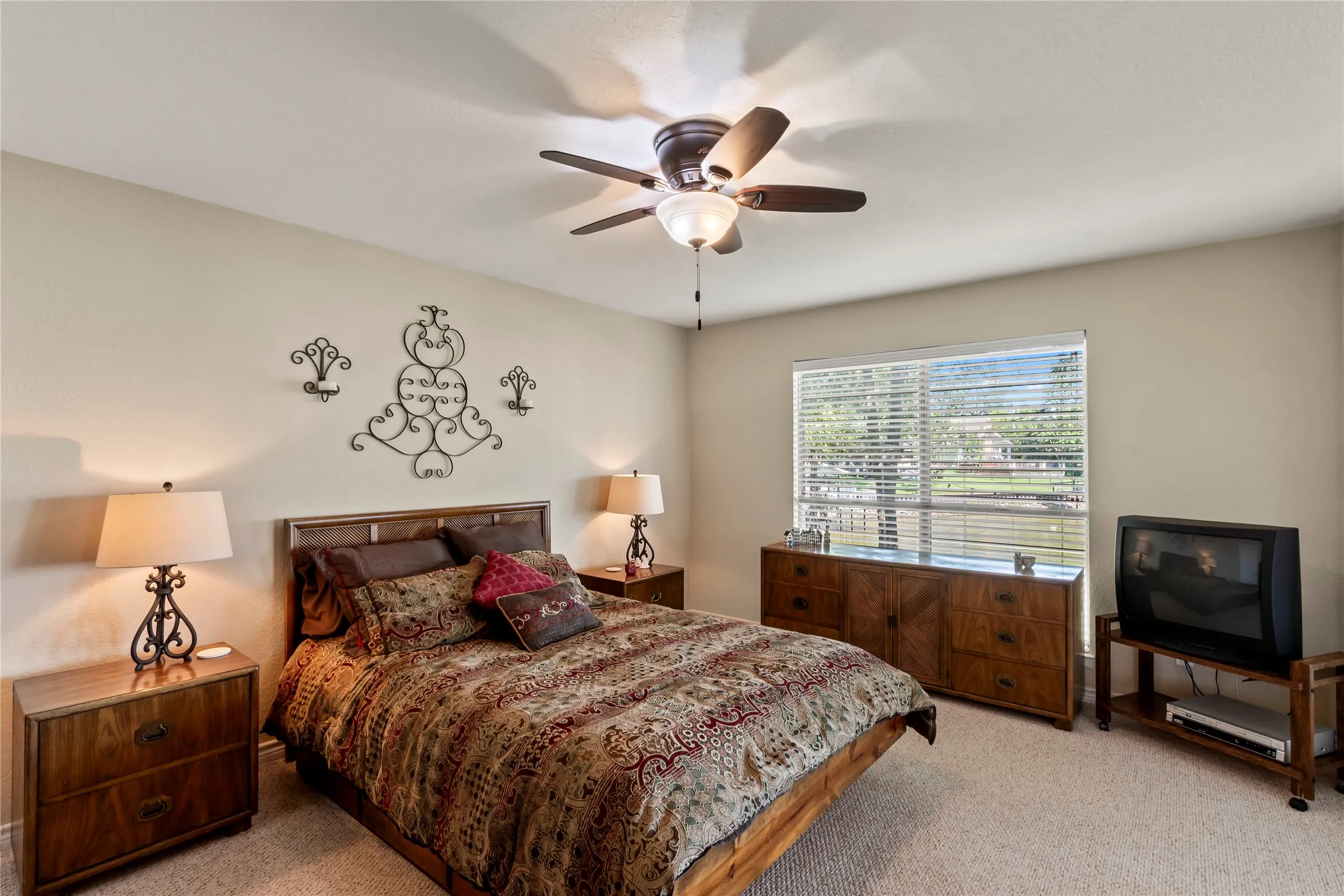 Second primary bedroom with a walk in closet