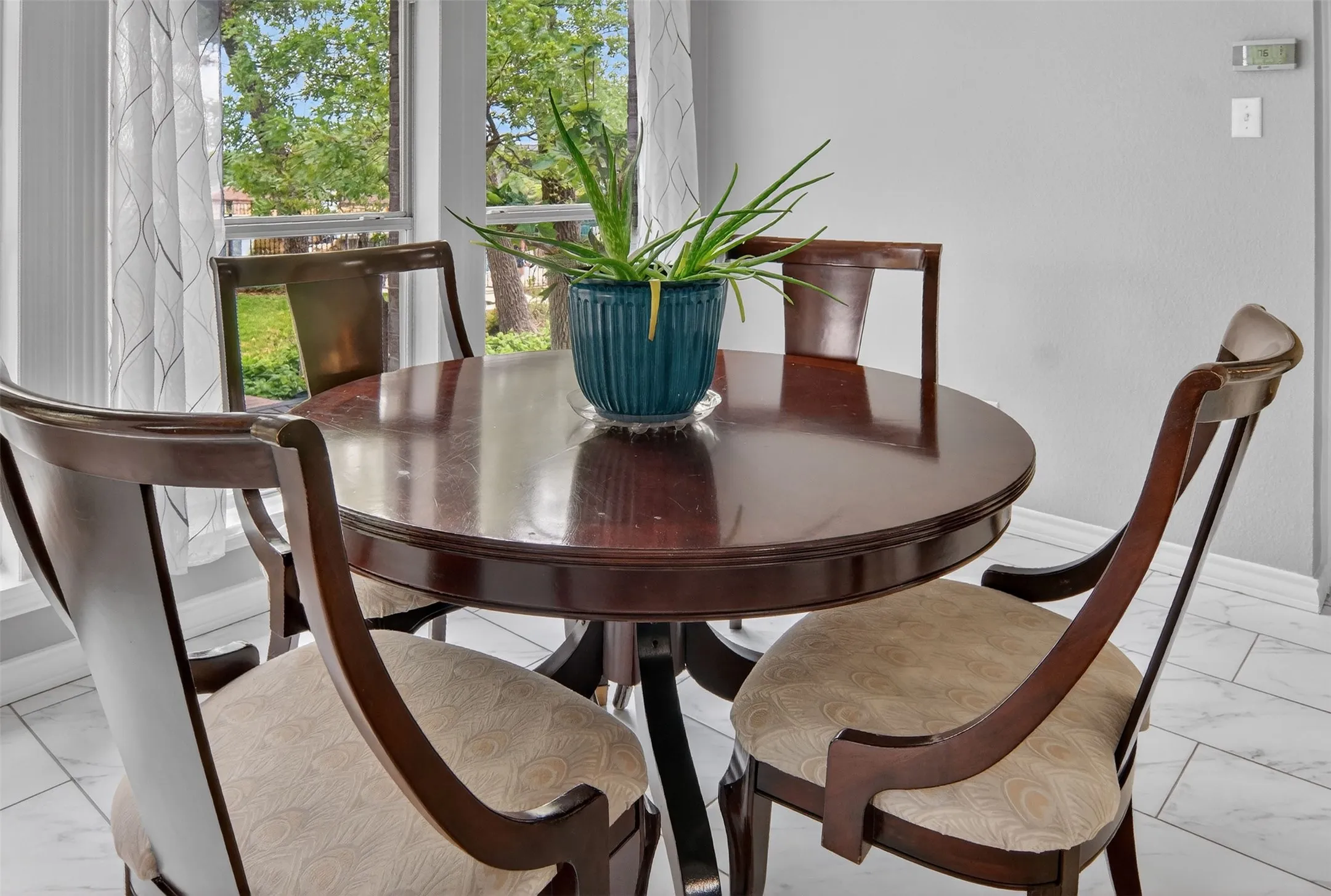 Spacious, sunny breakfast area with a lovely view.