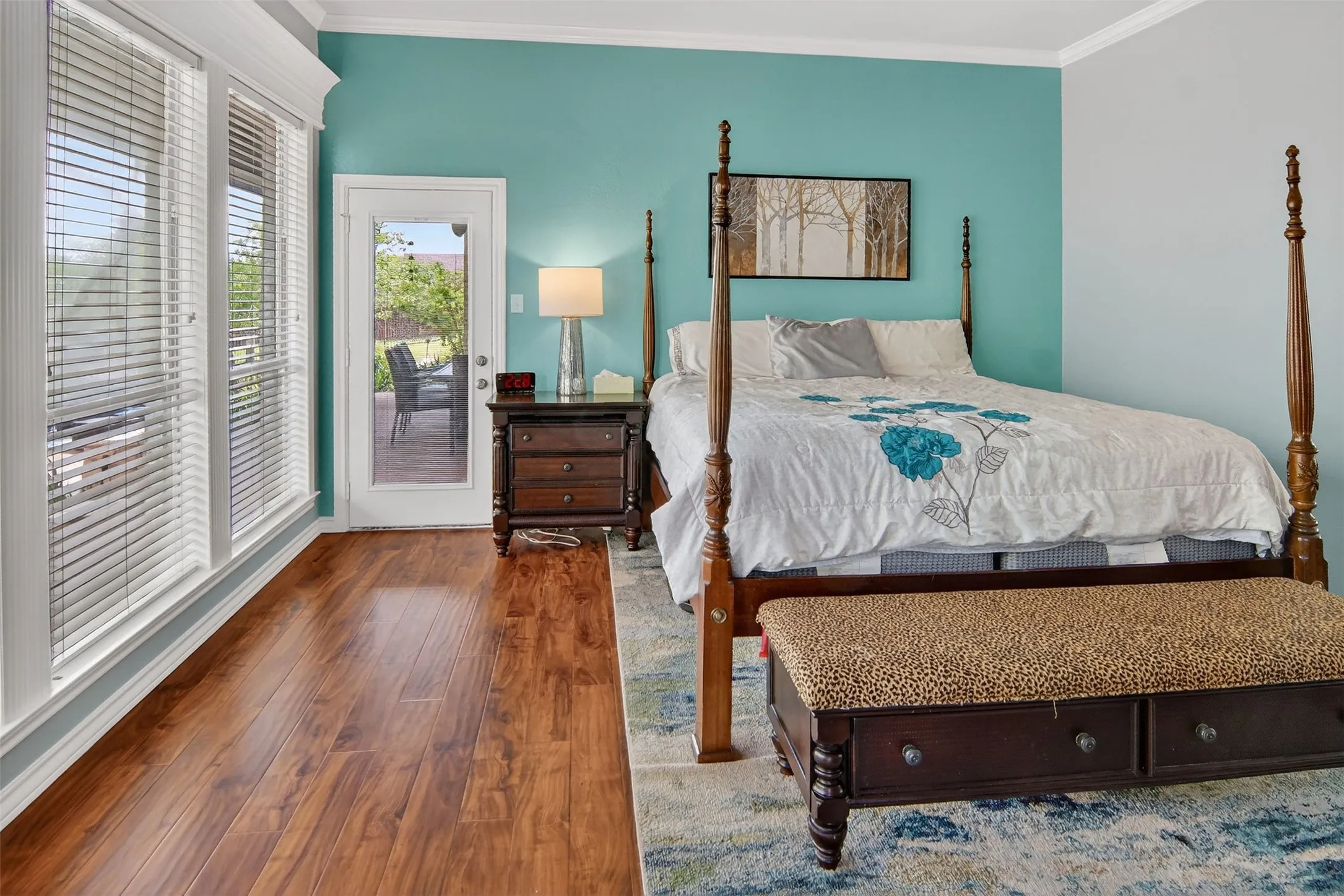 Primary bedroom has private access to covered backporch.