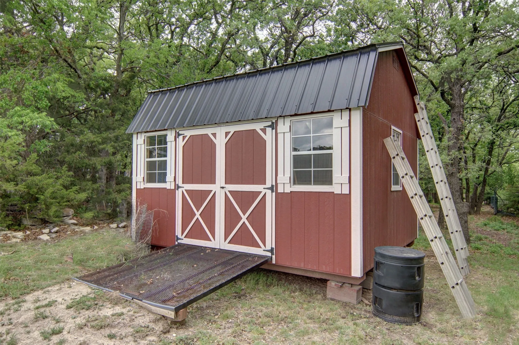 Great storage for yard tools and gardening supplies.