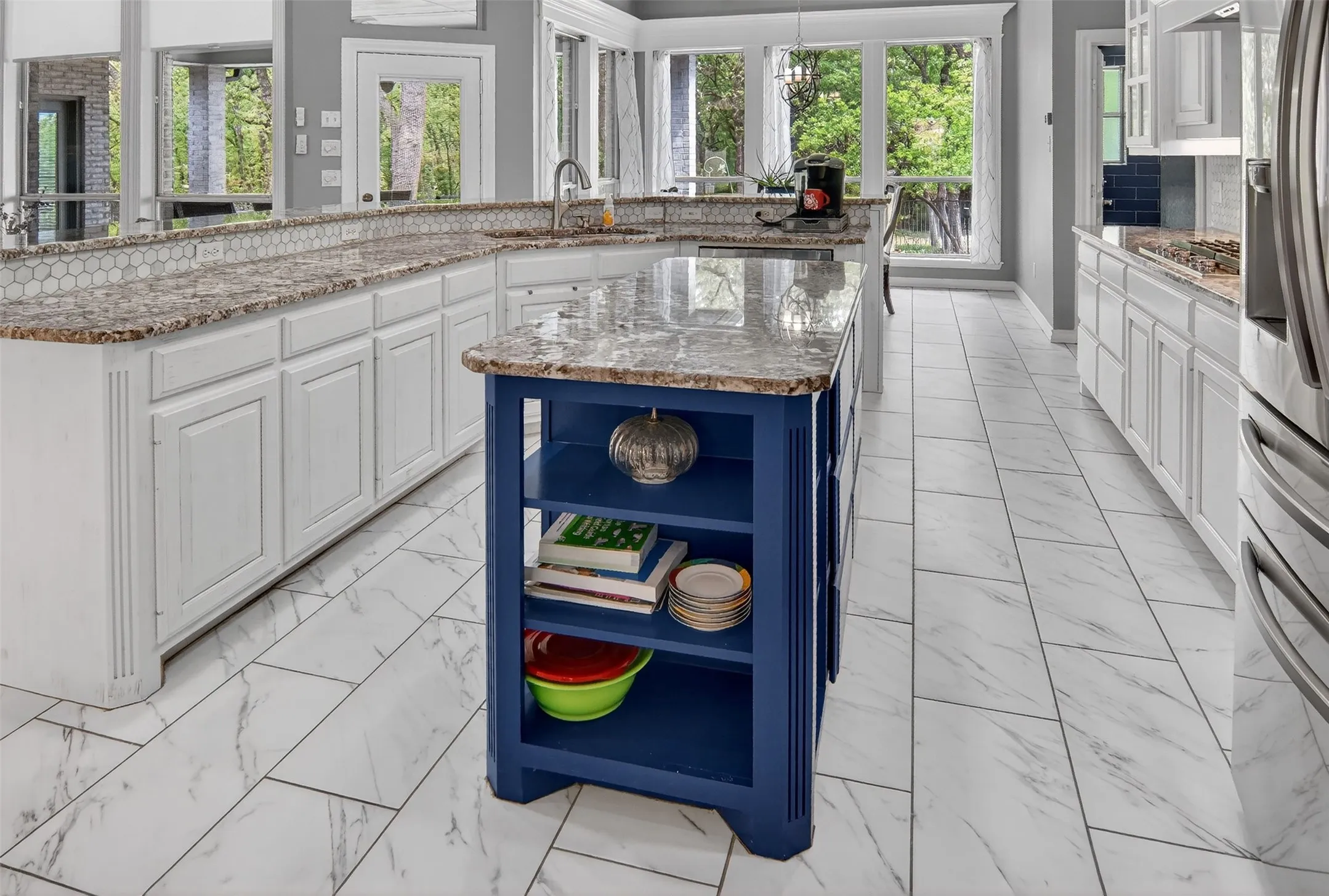Spacious kitchen with plenty of storage and island for prep work.