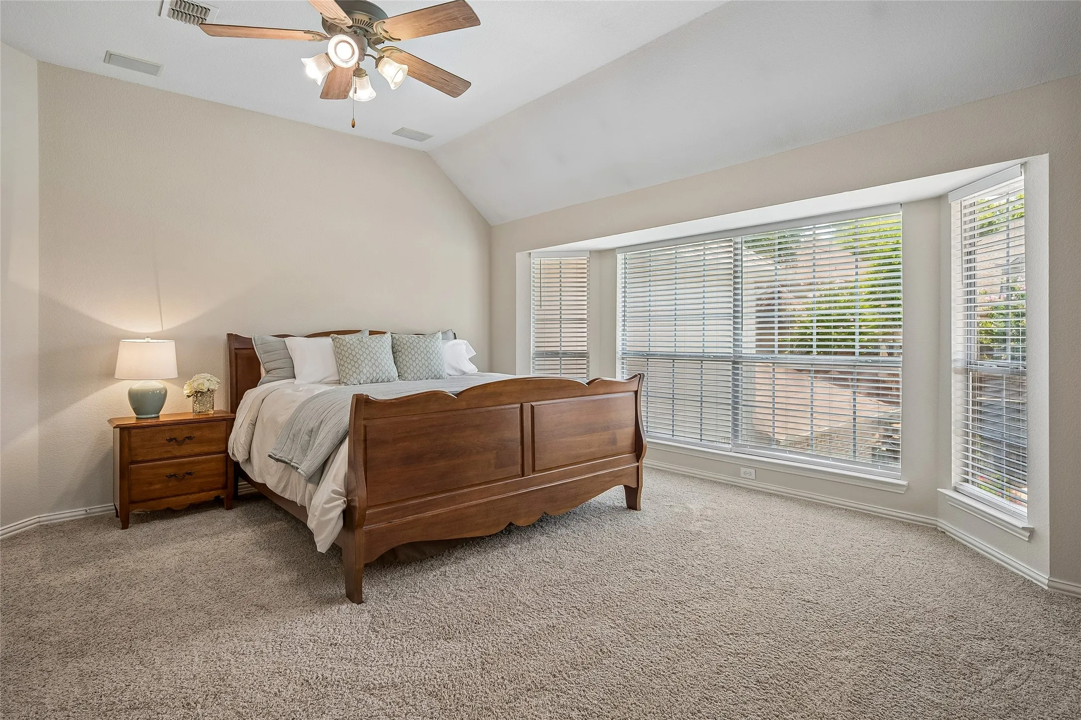 Enjoy the luxury of space with high ceilings and custom wall of windows.